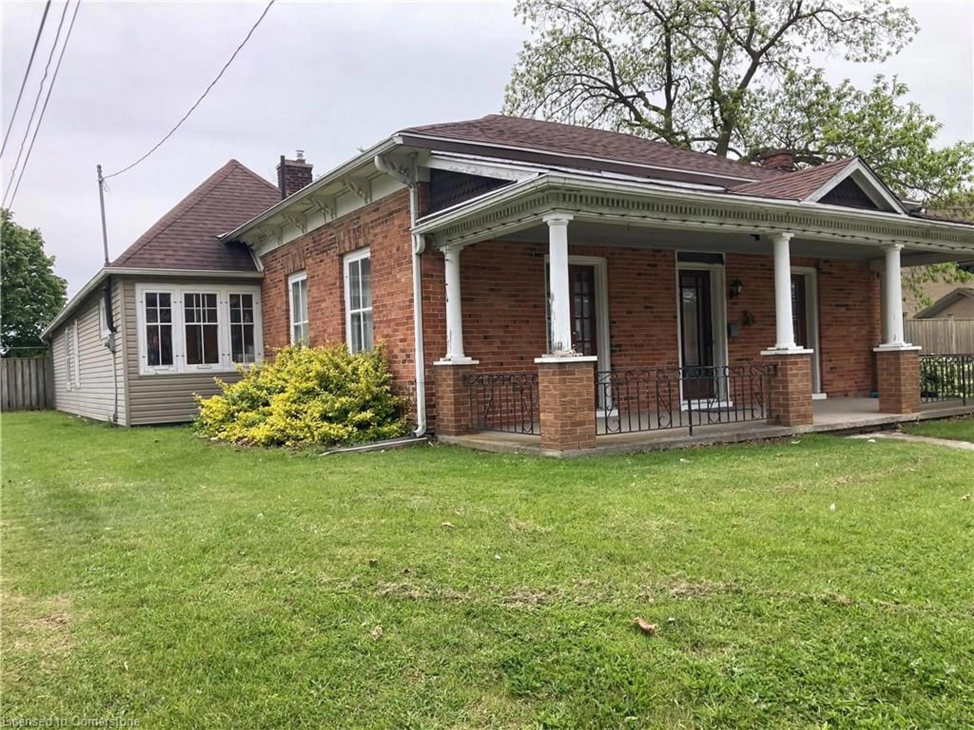 Home with brick exterior material, street for 212 Alder St, Dunnville Ontario N1A 1E1