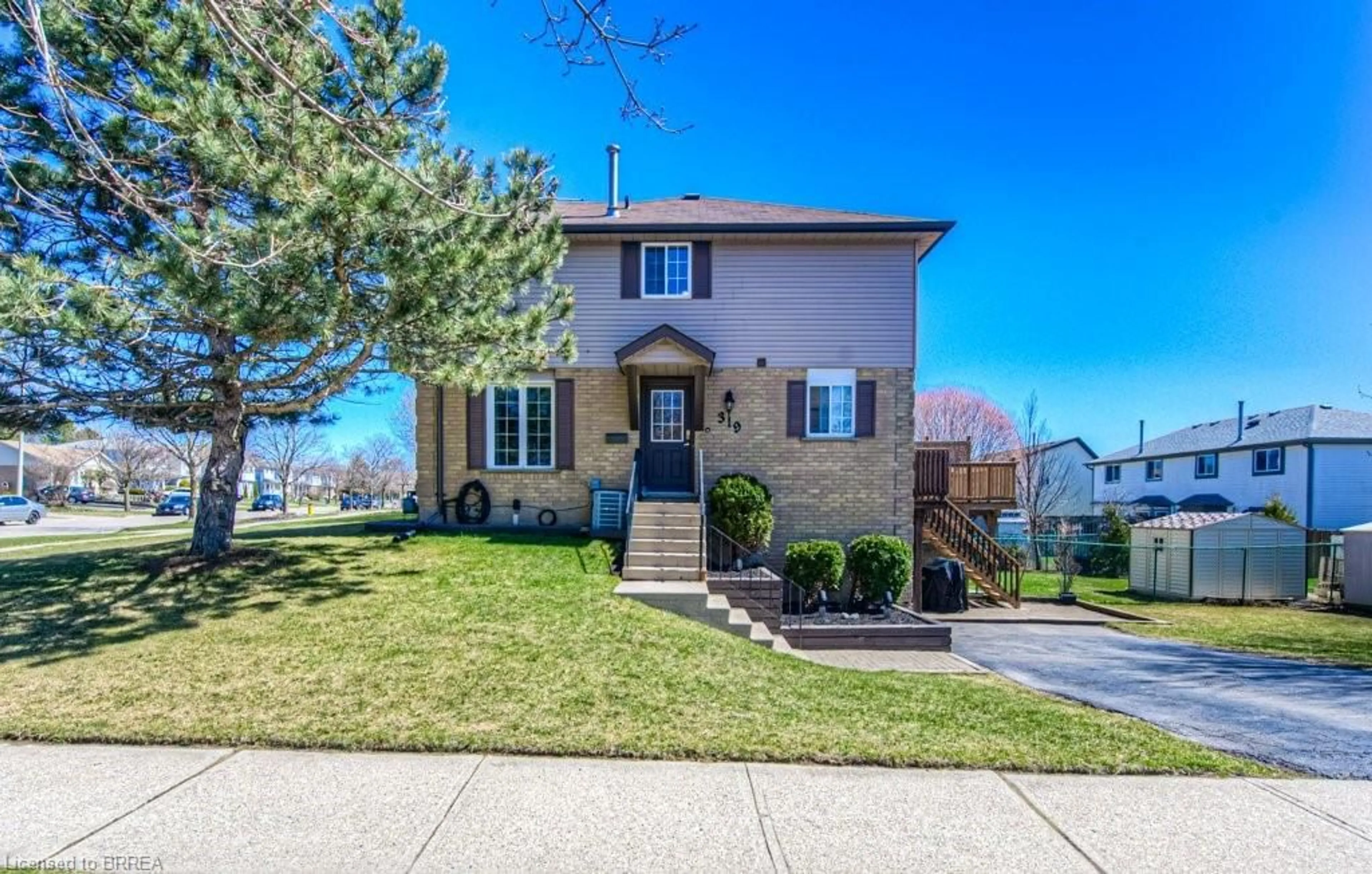 Home with brick exterior material, street for 319 Benesfort Cres, Kitchener Ontario N2N 3B6