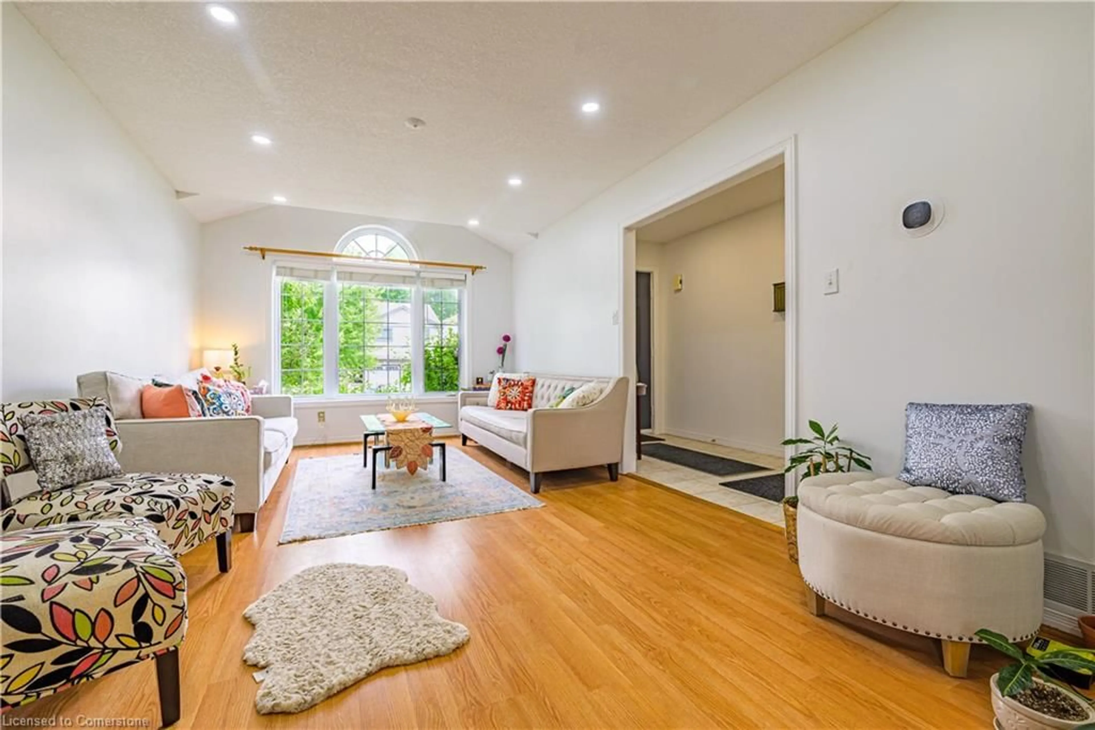 Living room with furniture, wood/laminate floor for 35 Melran Dr, Cambridge Ontario N3C 4C1