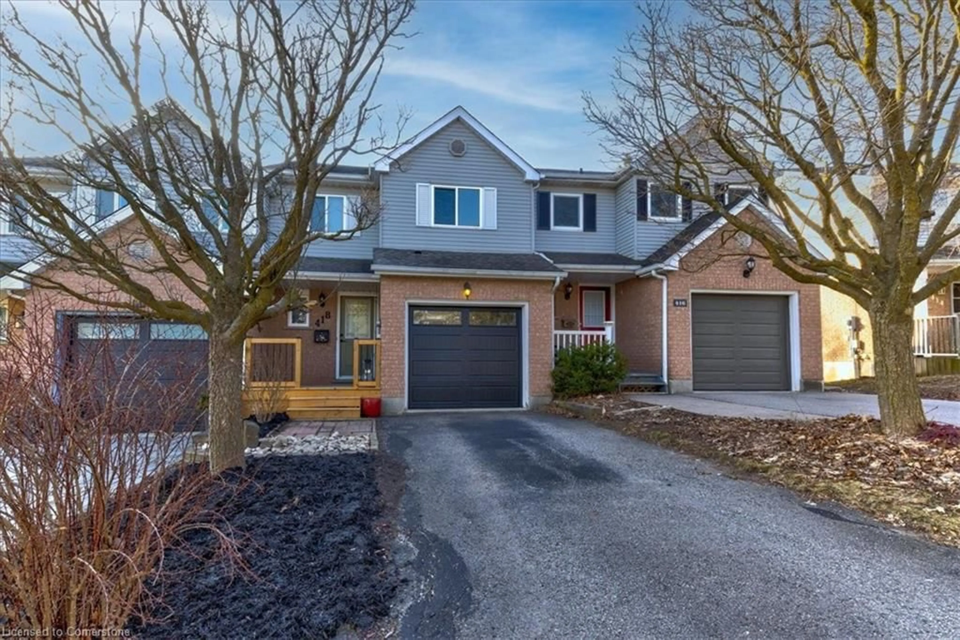 Home with brick exterior material, street for 418 Exmoor St, Waterloo Ontario N2K 3T7