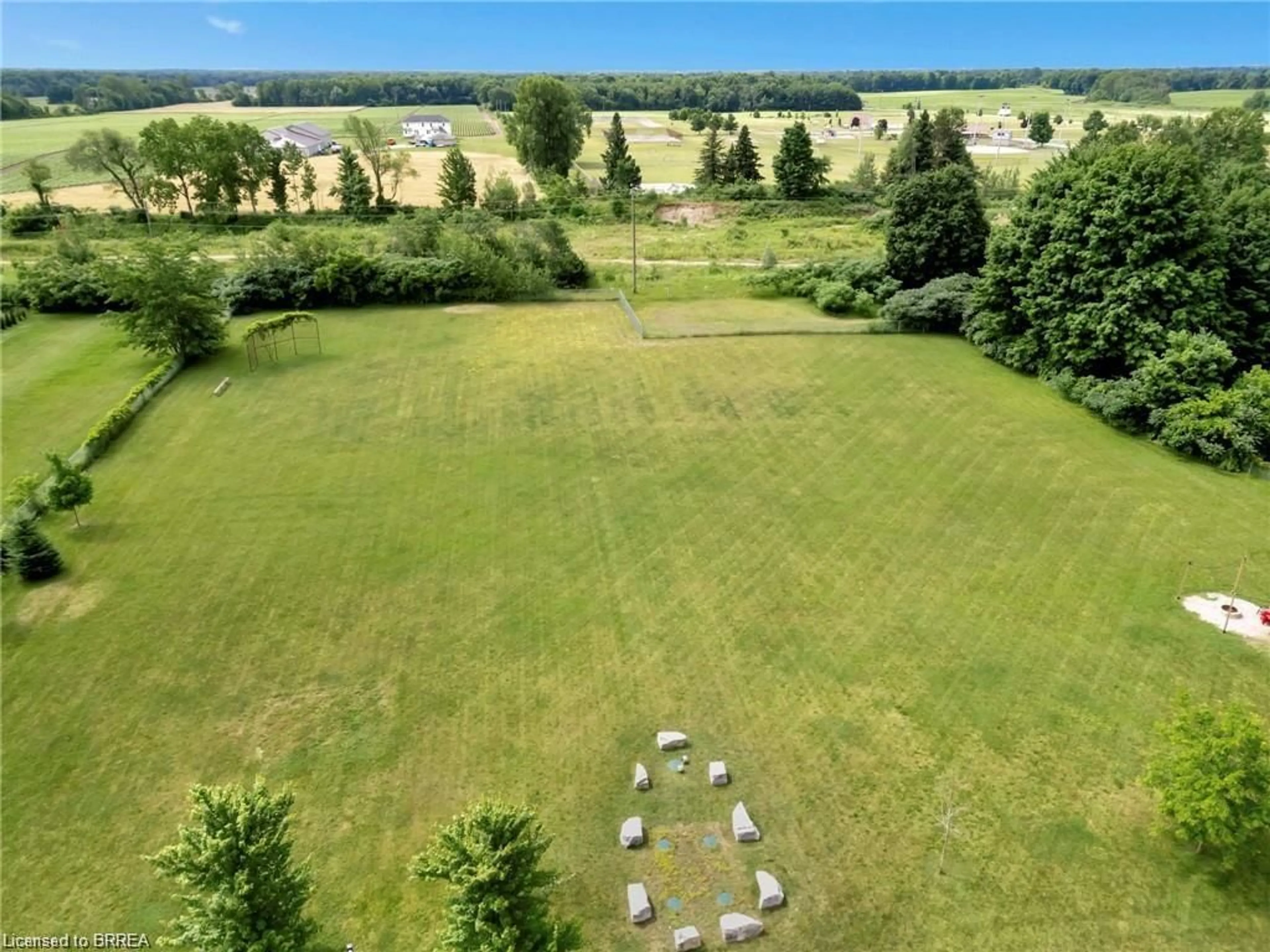 A pic from outside/outdoor area/front of a property/back of a property/a pic from drone, unknown for 992 Windham Rd #13, Windham Centre Ontario N0E 2A0