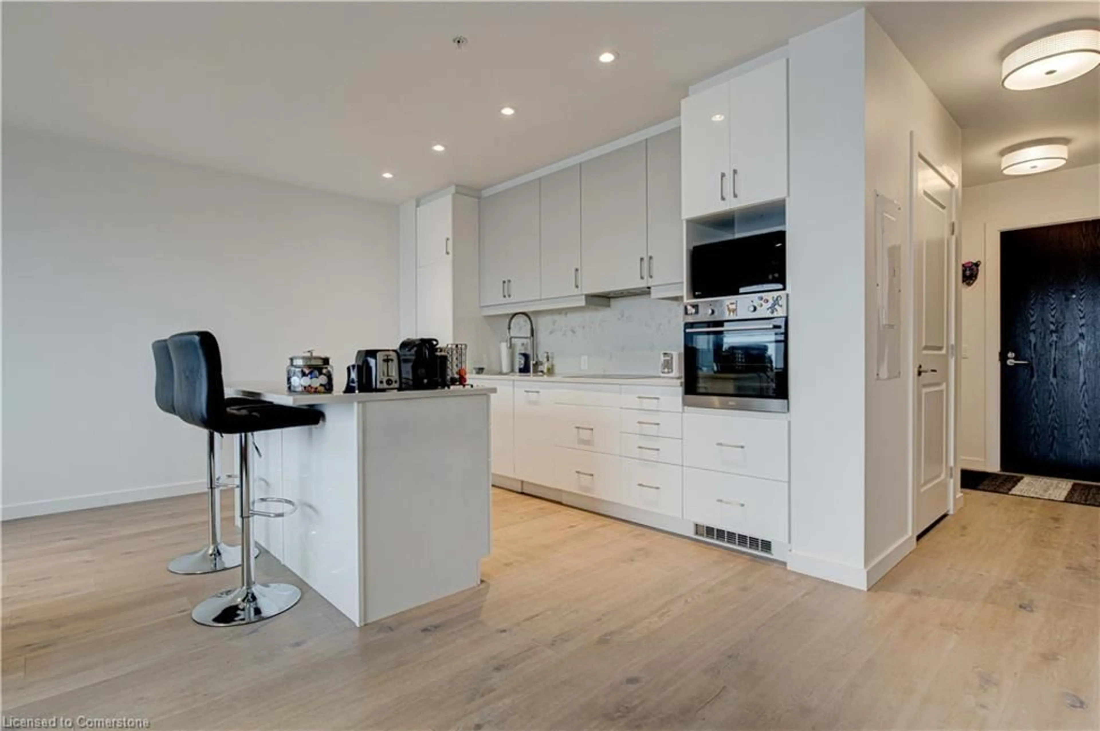 Open concept kitchen, wood/laminate floor for 181 King St #1205, Waterloo Ontario N2J 0E7