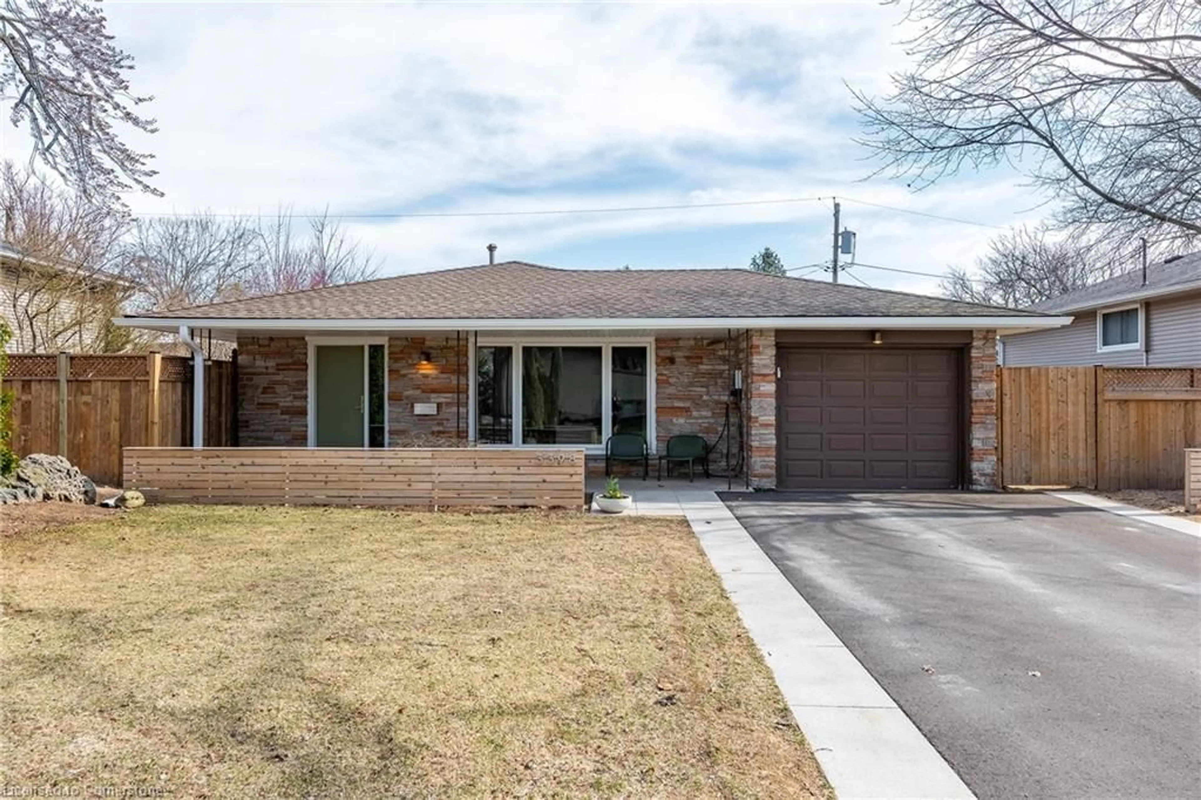 Home with brick exterior material, street for 3398 Guildwood Dr, Burlington Ontario L7N 1L7