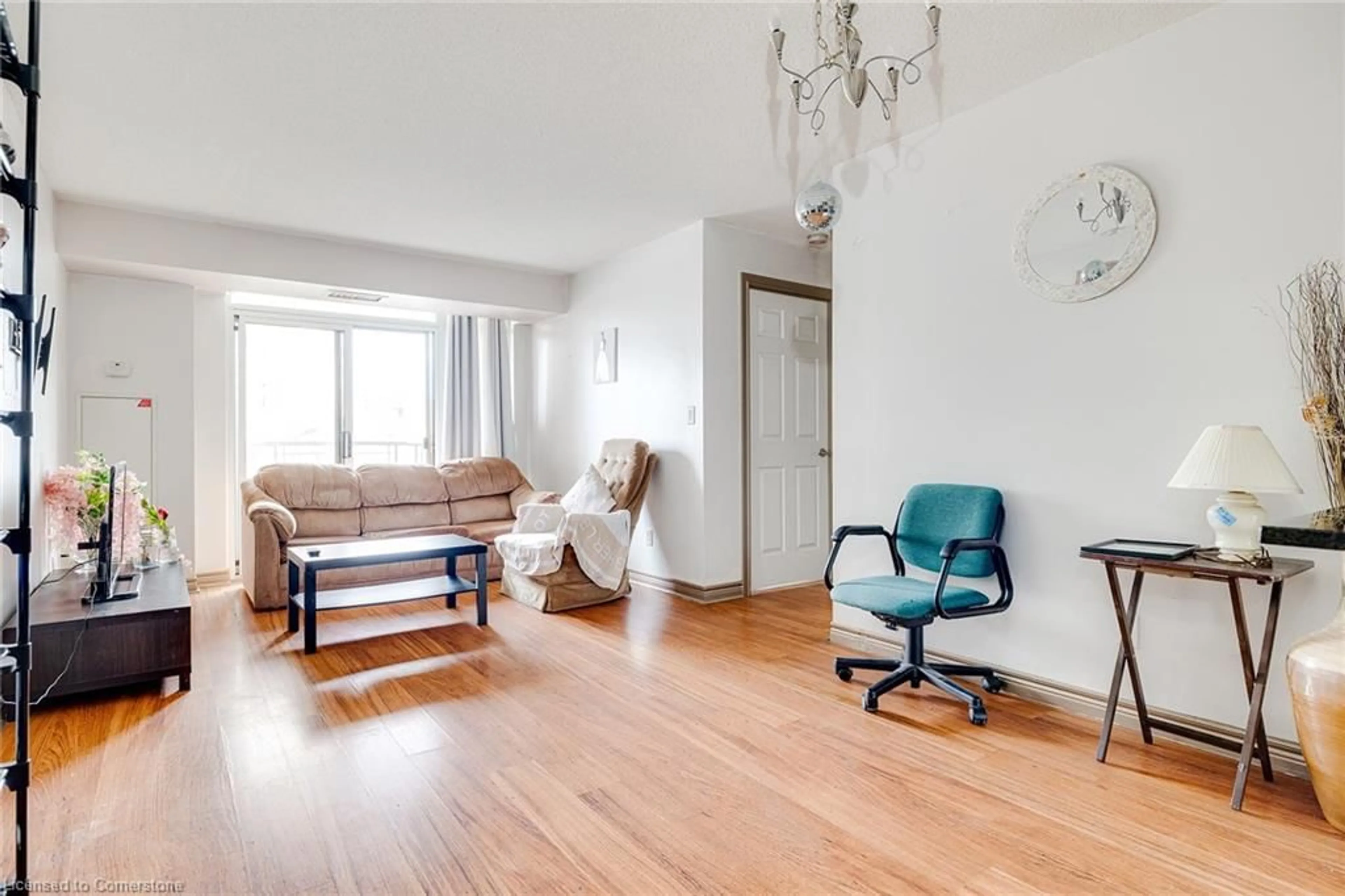 Living room with furniture, wood/laminate floor for 310 Burnhamthorpe Rd #503, Mississauga Ontario L5B 4P9