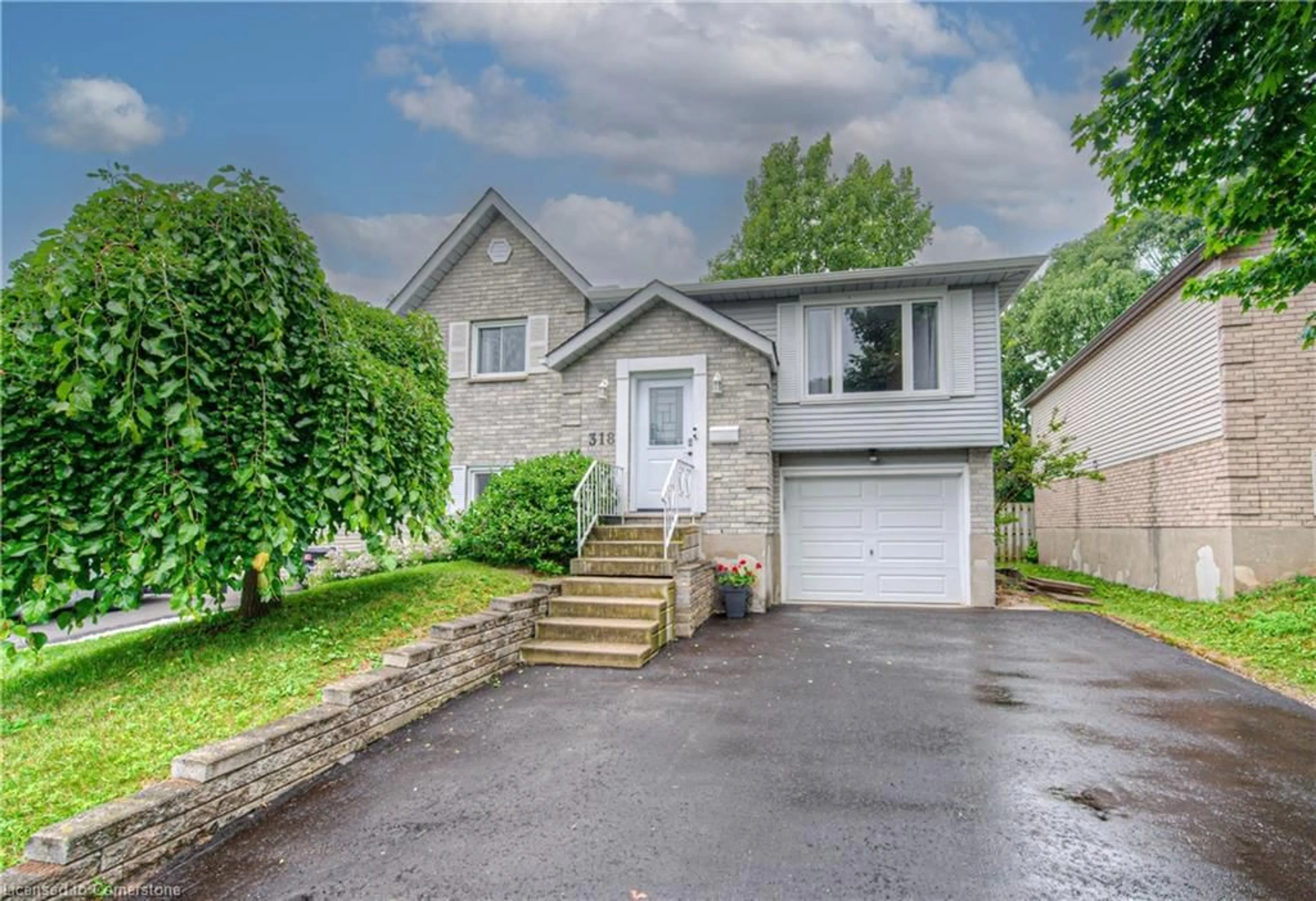 Home with vinyl exterior material, street for 318 Sekura St, Cambridge Ontario N1R 7W2