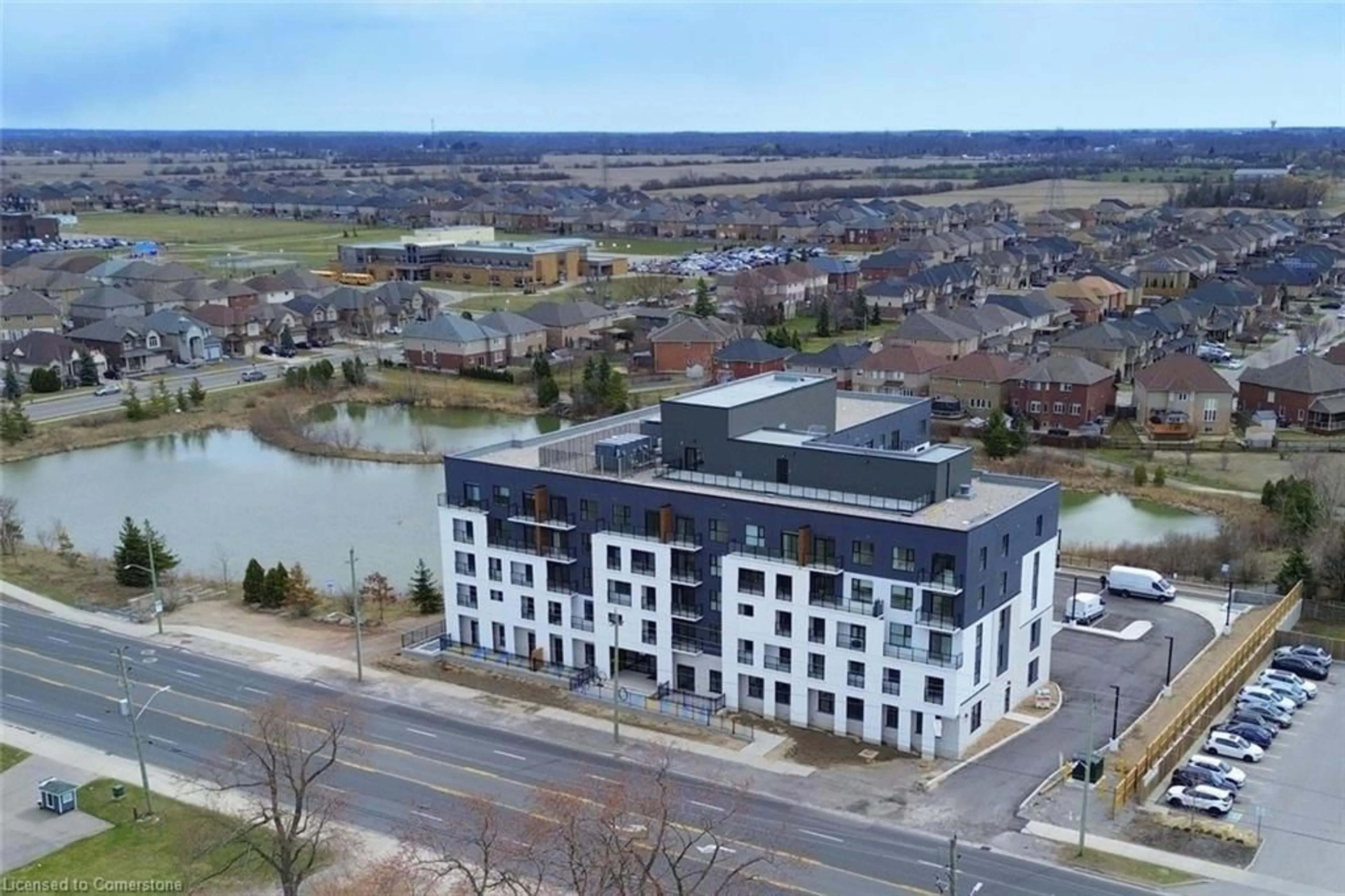 A pic from outside/outdoor area/front of a property/back of a property/a pic from drone, water/lake/river/ocean view for 1936 Rymal Rd #211, Hamilton Ontario L0R 1P0