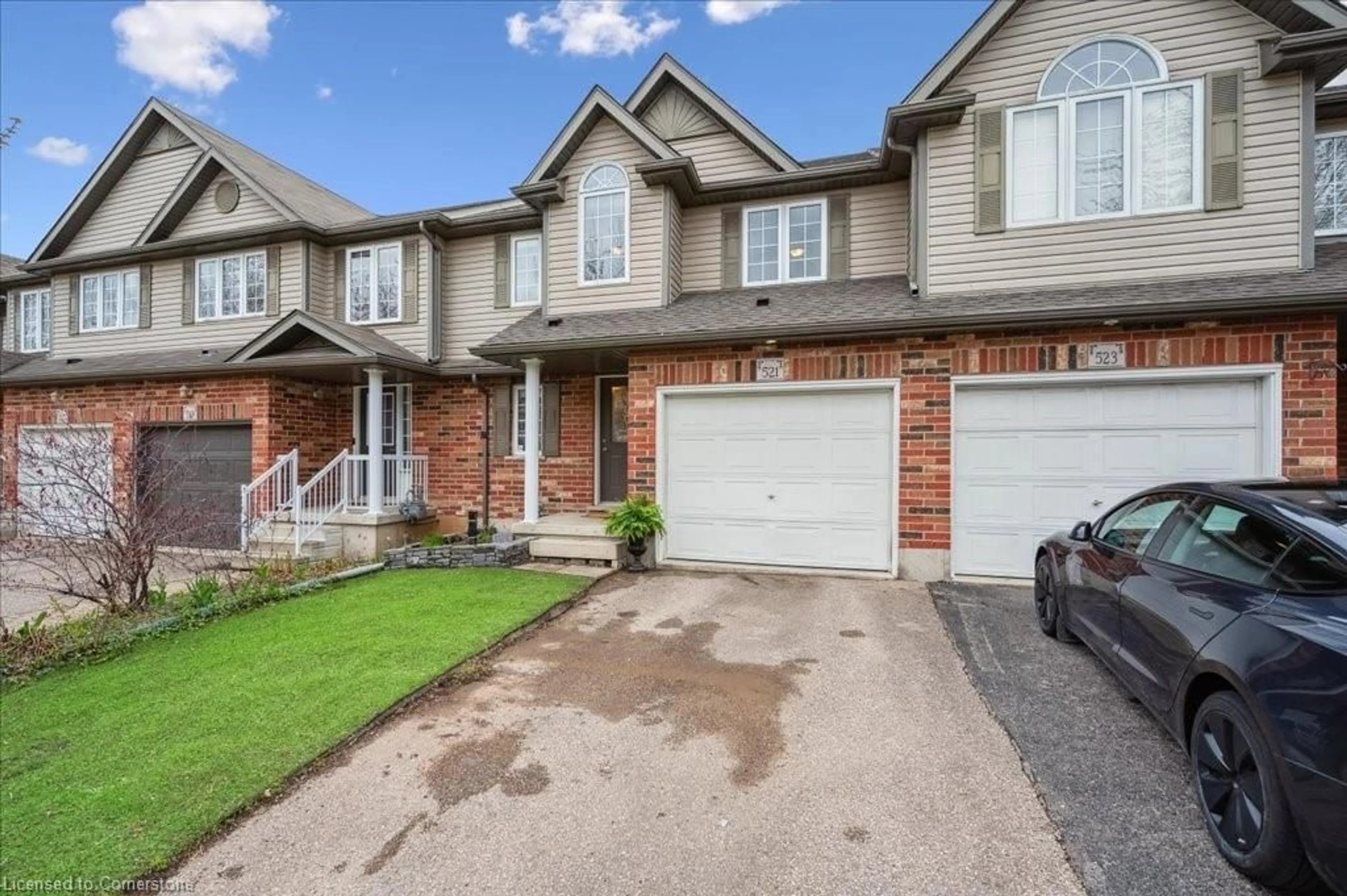 Home with brick exterior material, street for 521 Virginia Creeper St, Waterloo Ontario N2V 2W3