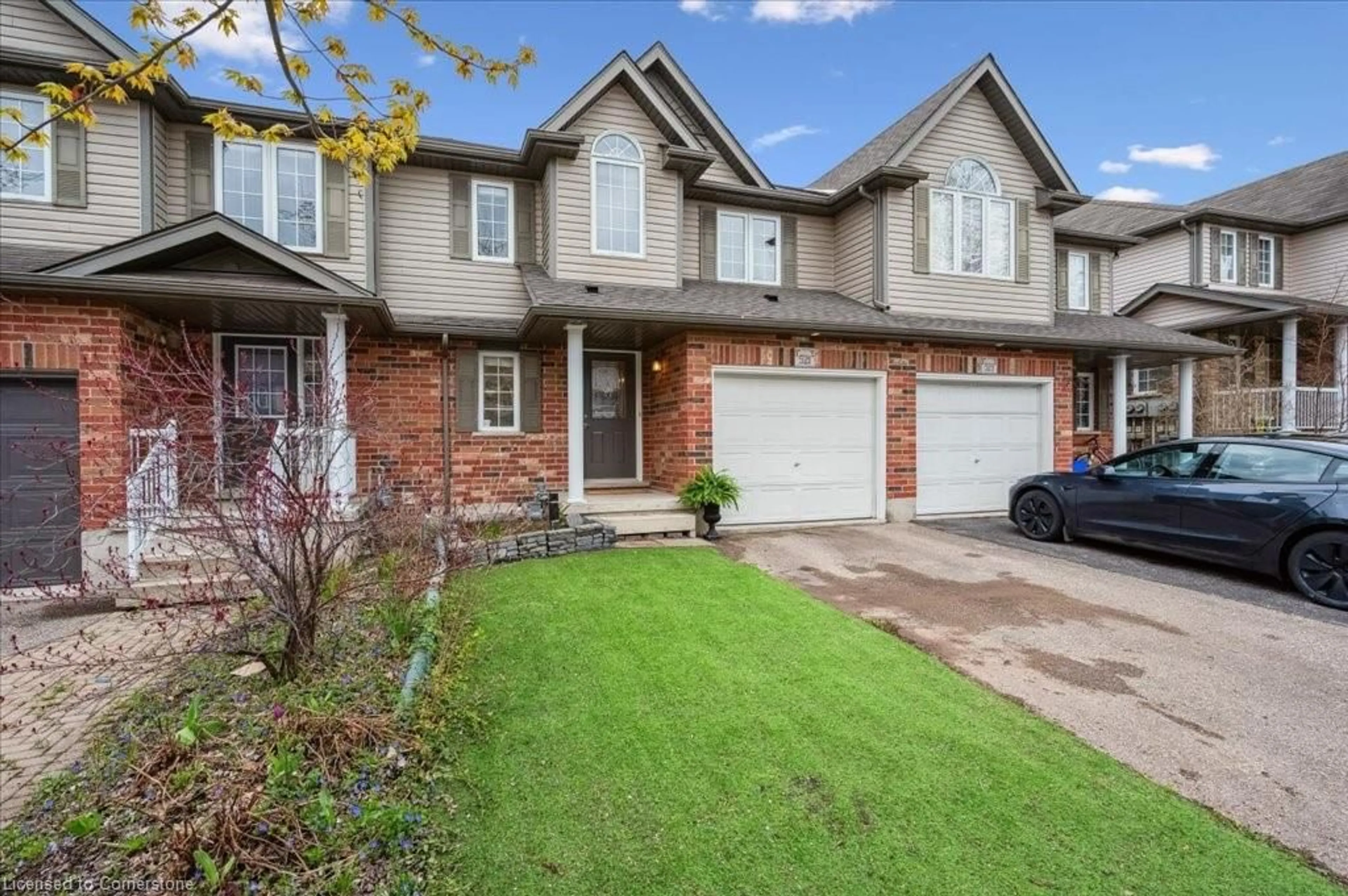 Home with brick exterior material, street for 521 Virginia Creeper St, Waterloo Ontario N2V 2W3
