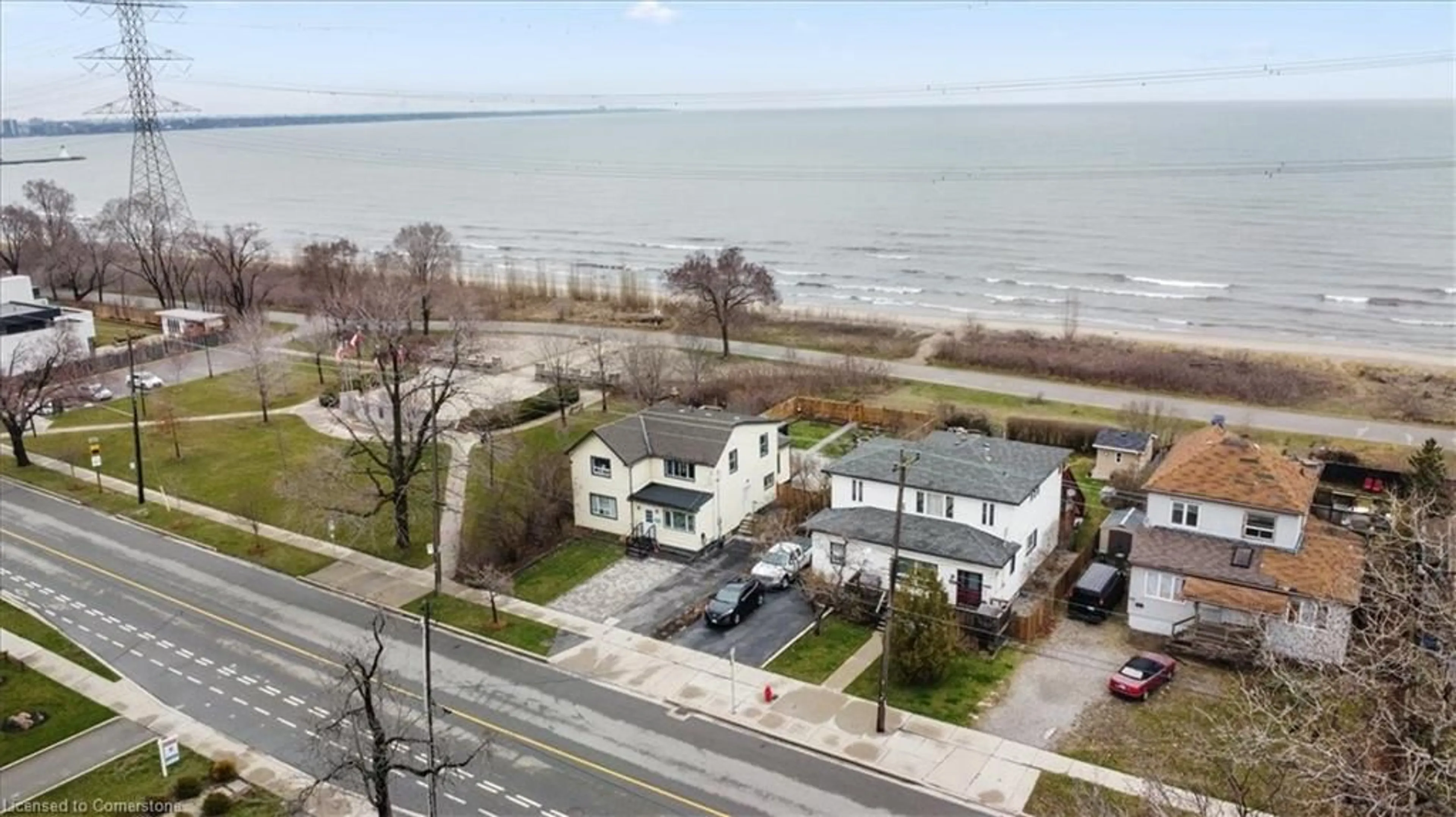 A pic from outside/outdoor area/front of a property/back of a property/a pic from drone, water/lake/river/ocean view for 1019 Beach Blvd, Hamilton Ontario L8H 6Z8