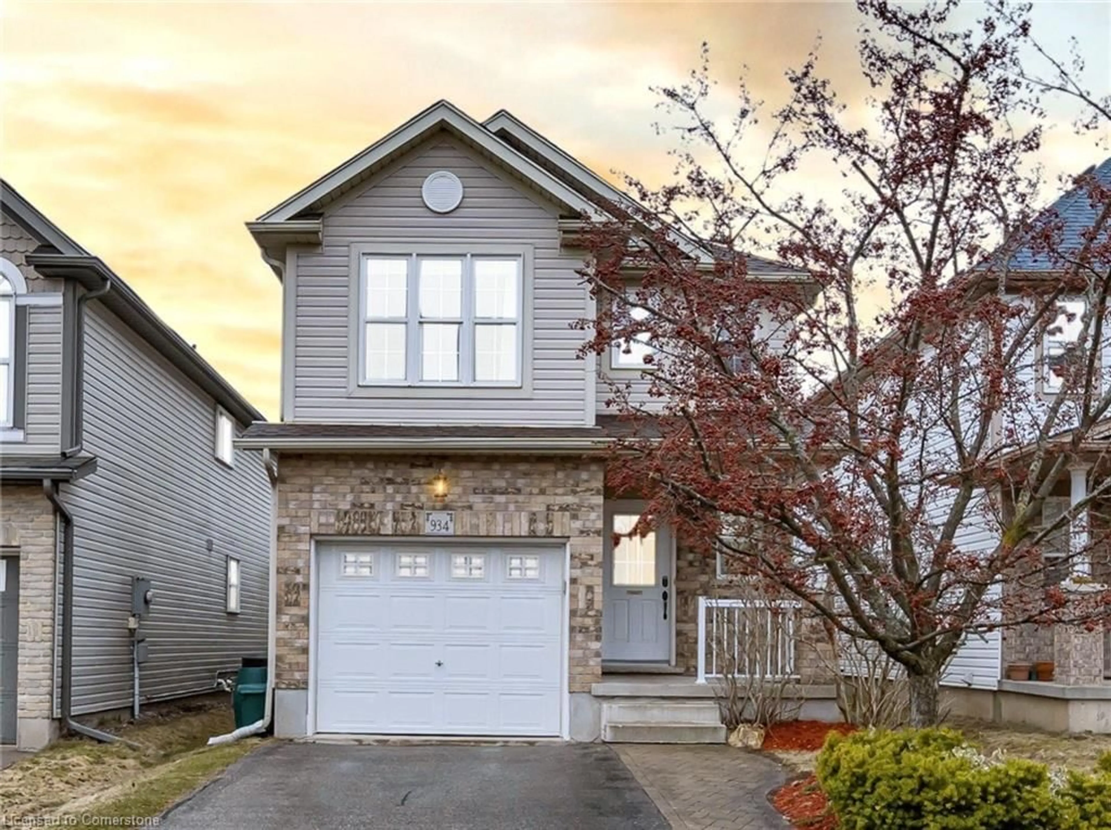 Home with vinyl exterior material, street for 934 Creekside Dr, Waterloo Ontario N2V 2W6