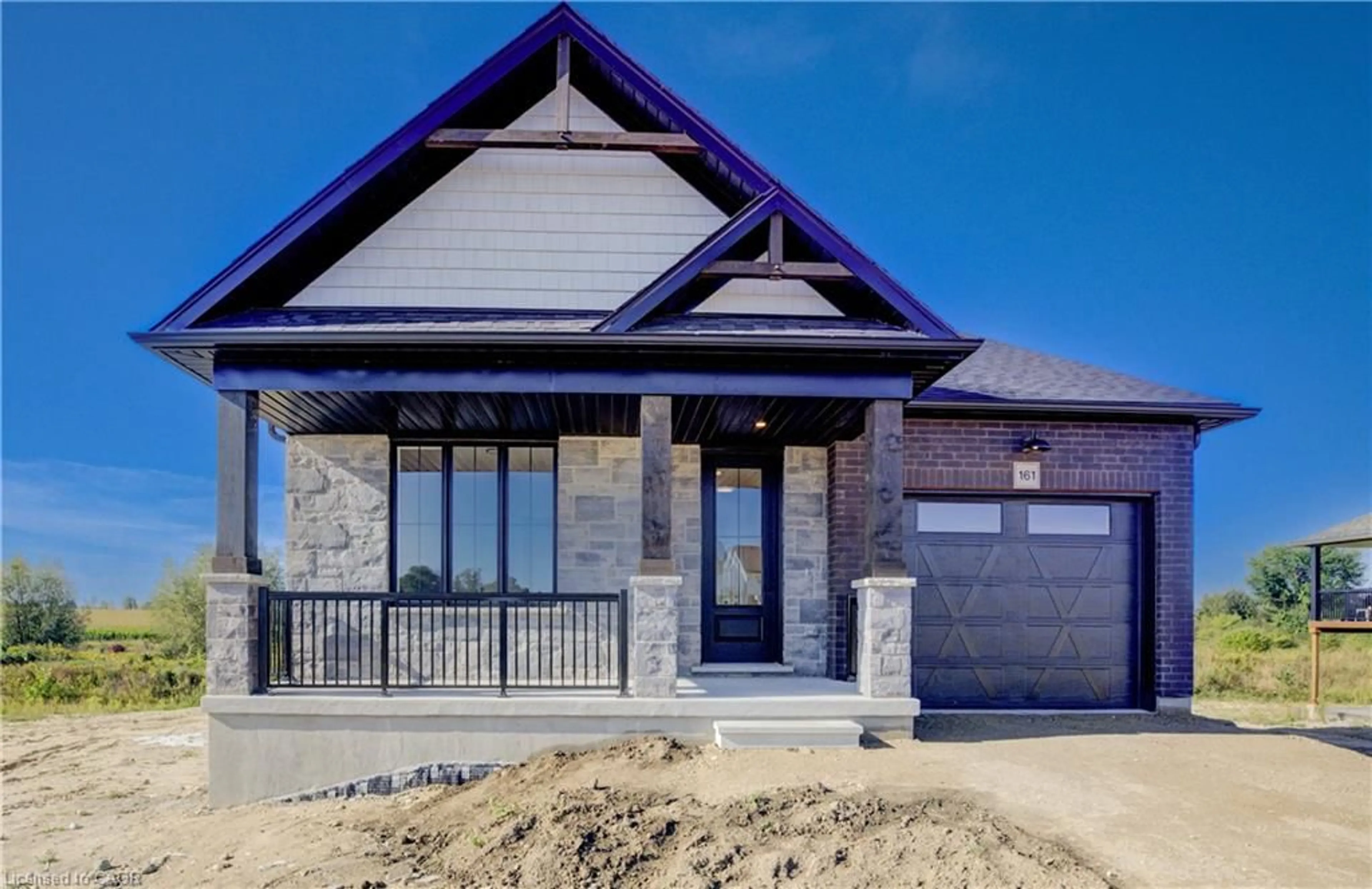 Home with brick exterior material, street for 117 Thackeray Way, Harriston Ontario N0G 1Z0