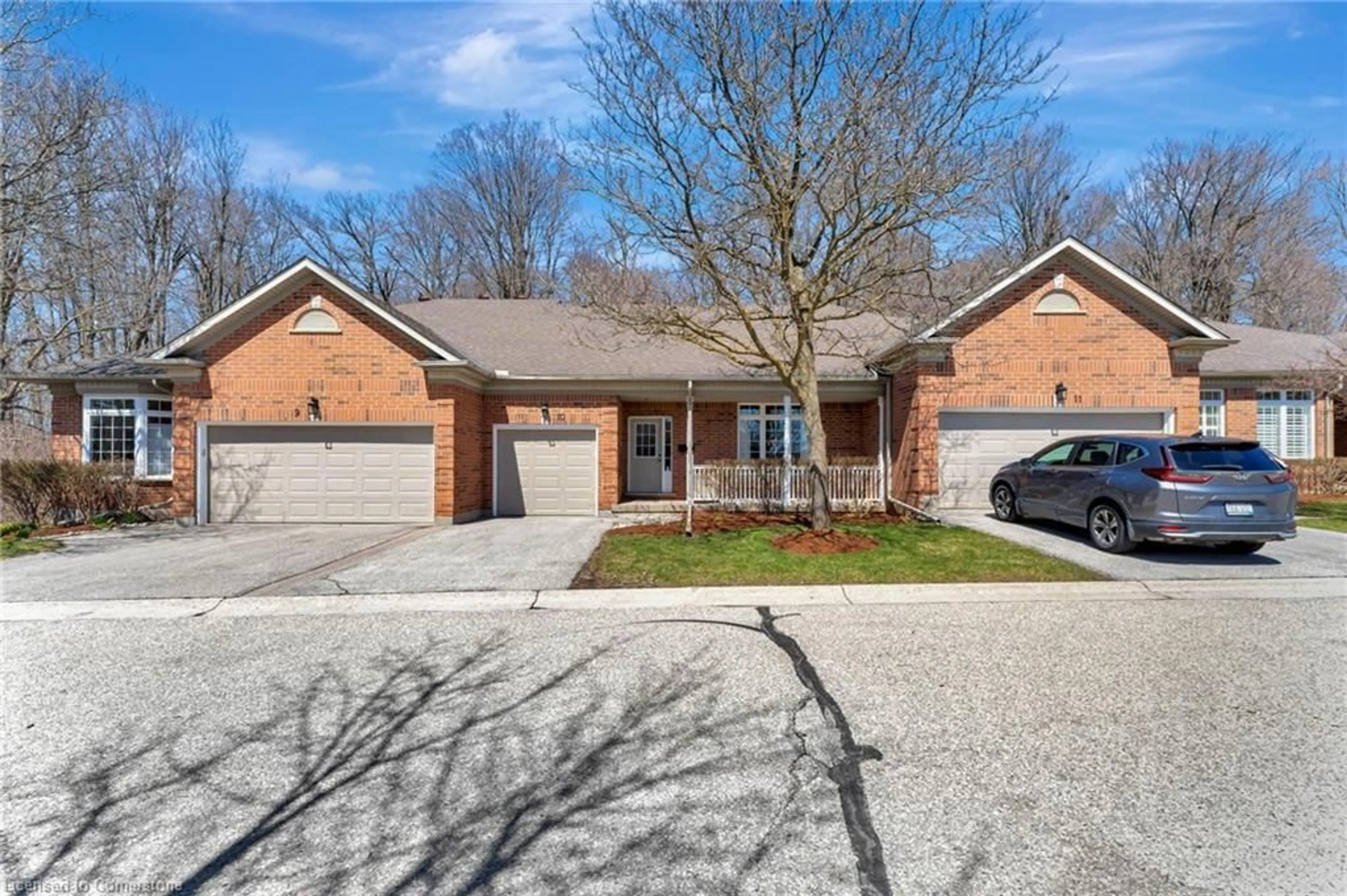 Home with brick exterior material, street for 450 Westforest Trail #10, Kitchener Ontario N2N 3M2