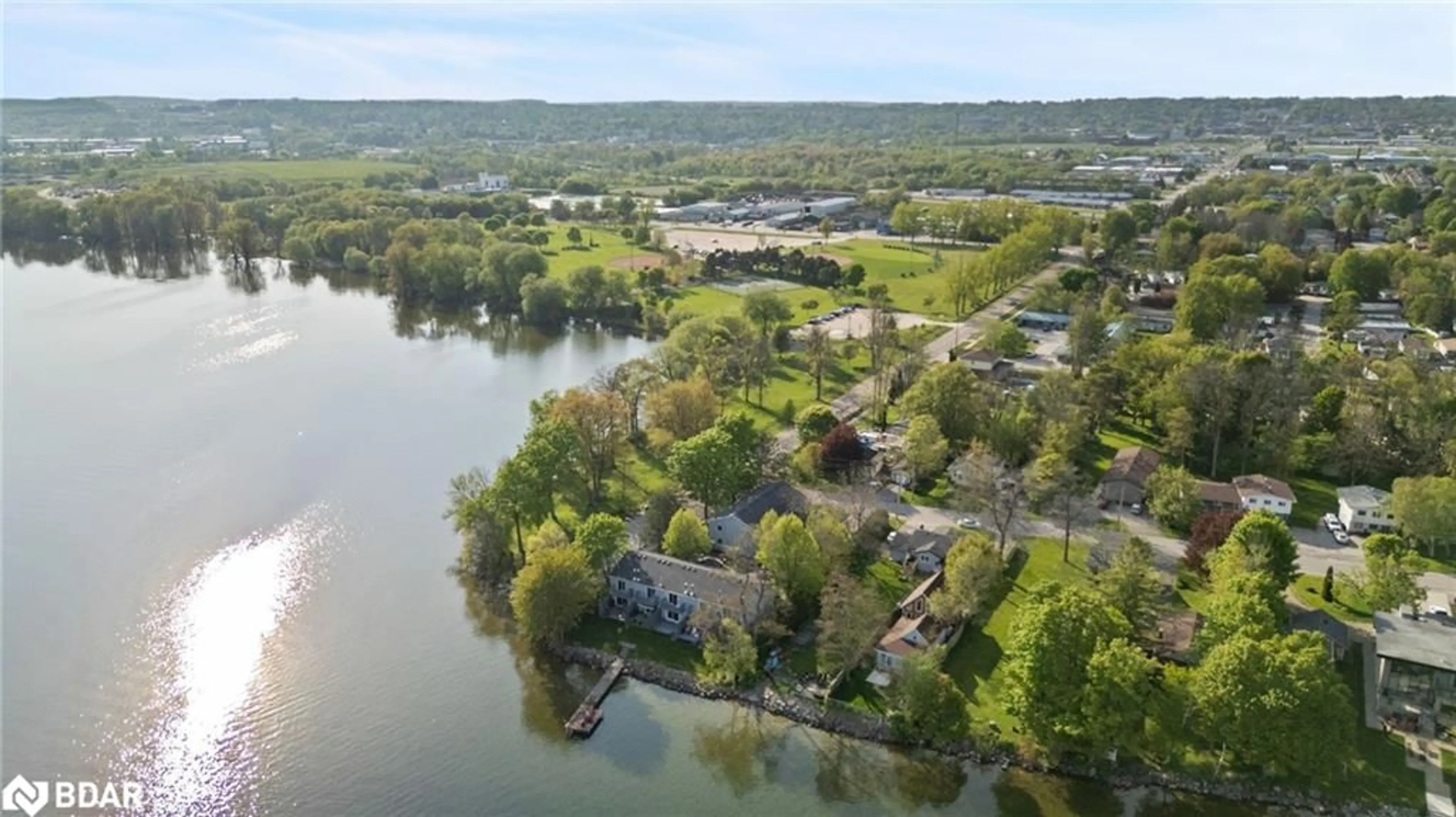 A pic from outside/outdoor area/front of a property/back of a property/a pic from drone, water/lake/river/ocean view for 1 Olive Cres #4, Orillia Ontario L3V 7N5