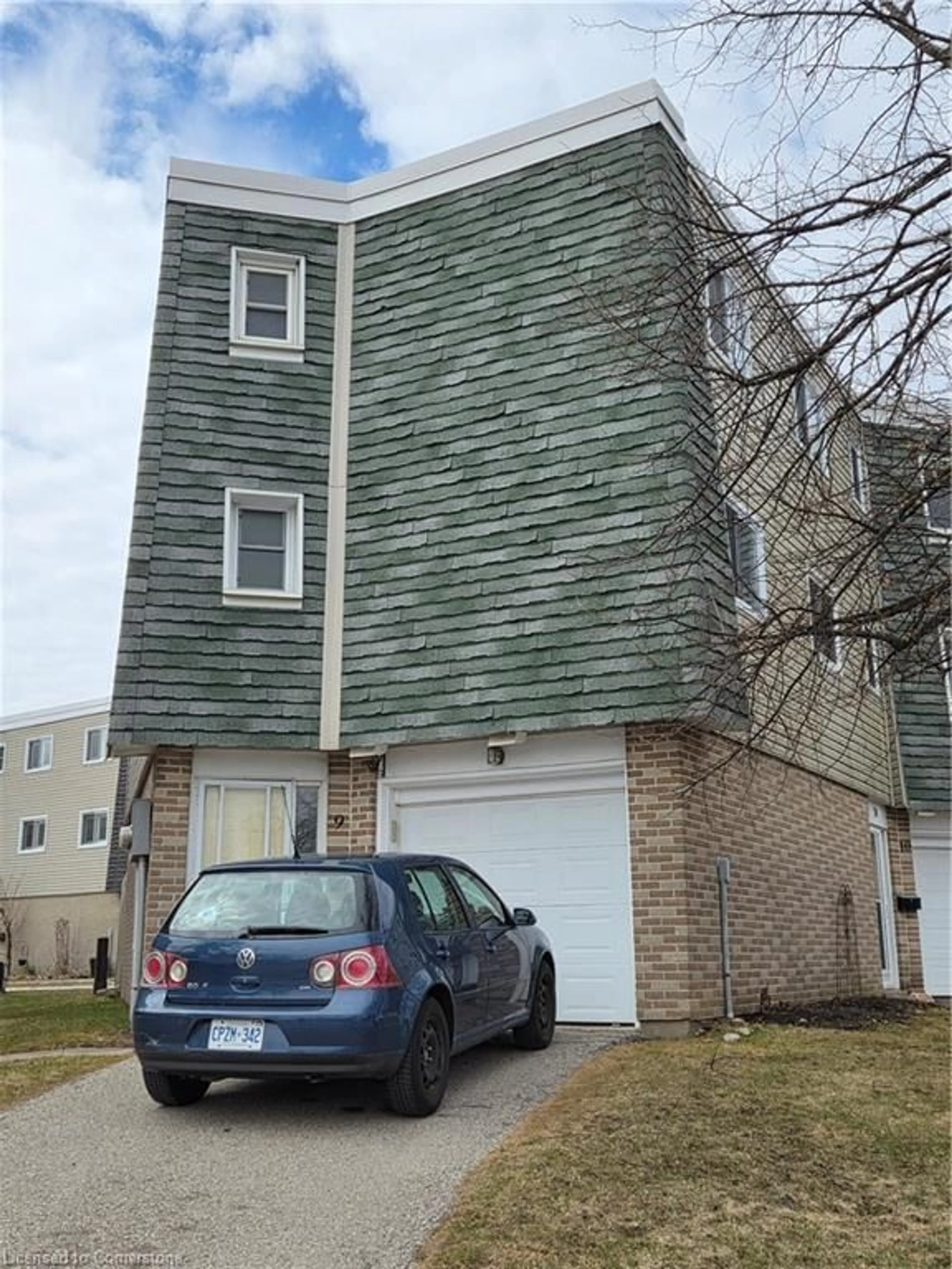 Home with vinyl exterior material, street for 60 Elmsdale Dr #9, Kitchener Ontario N2E 2G4
