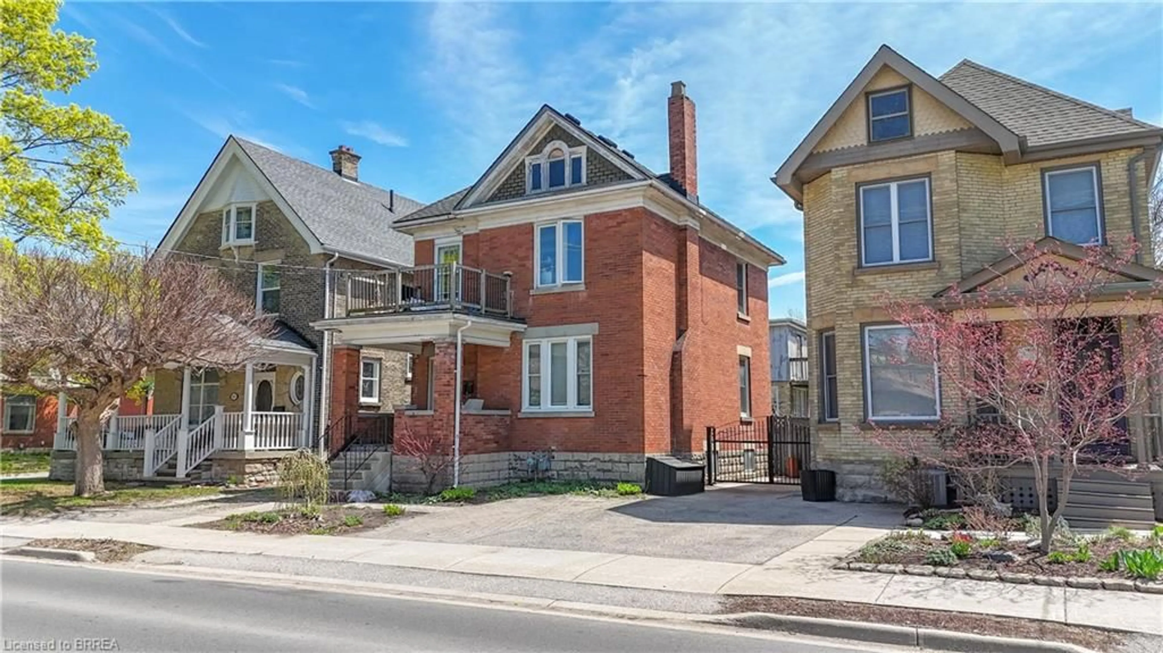 Home with brick exterior material, street for 867 Queens Ave, London Ontario N5W 3H7
