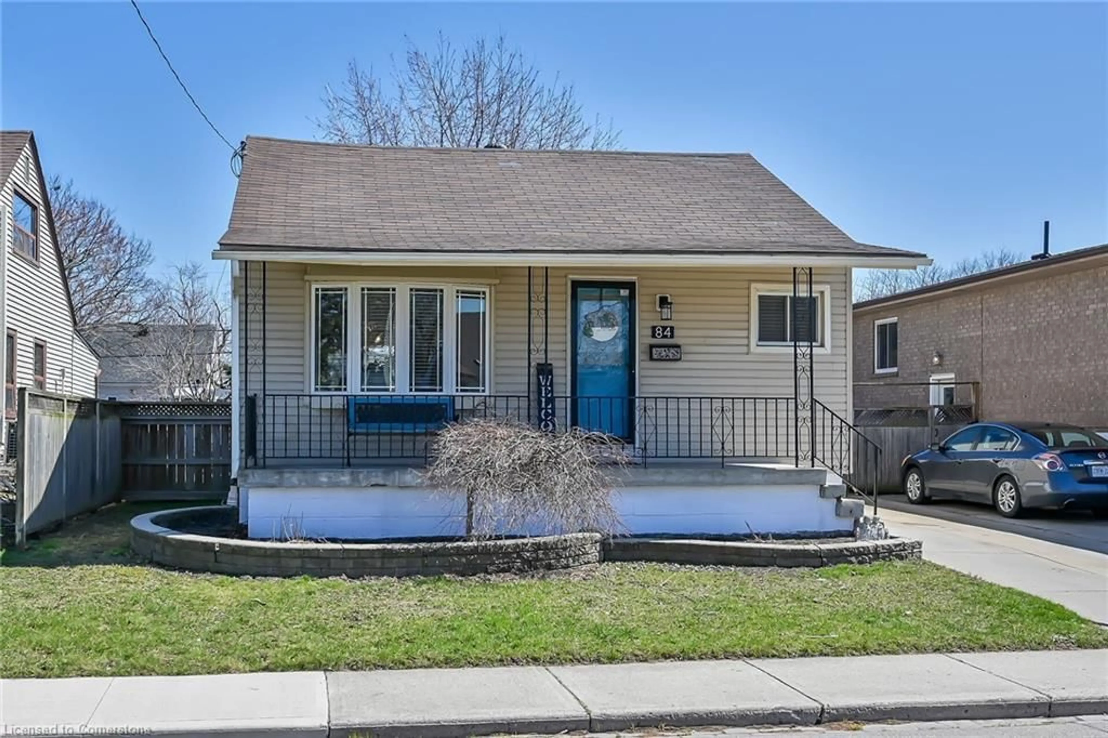 Home with vinyl exterior material, street for 84 Ivon Ave, Hamilton Ontario L8H 5S6