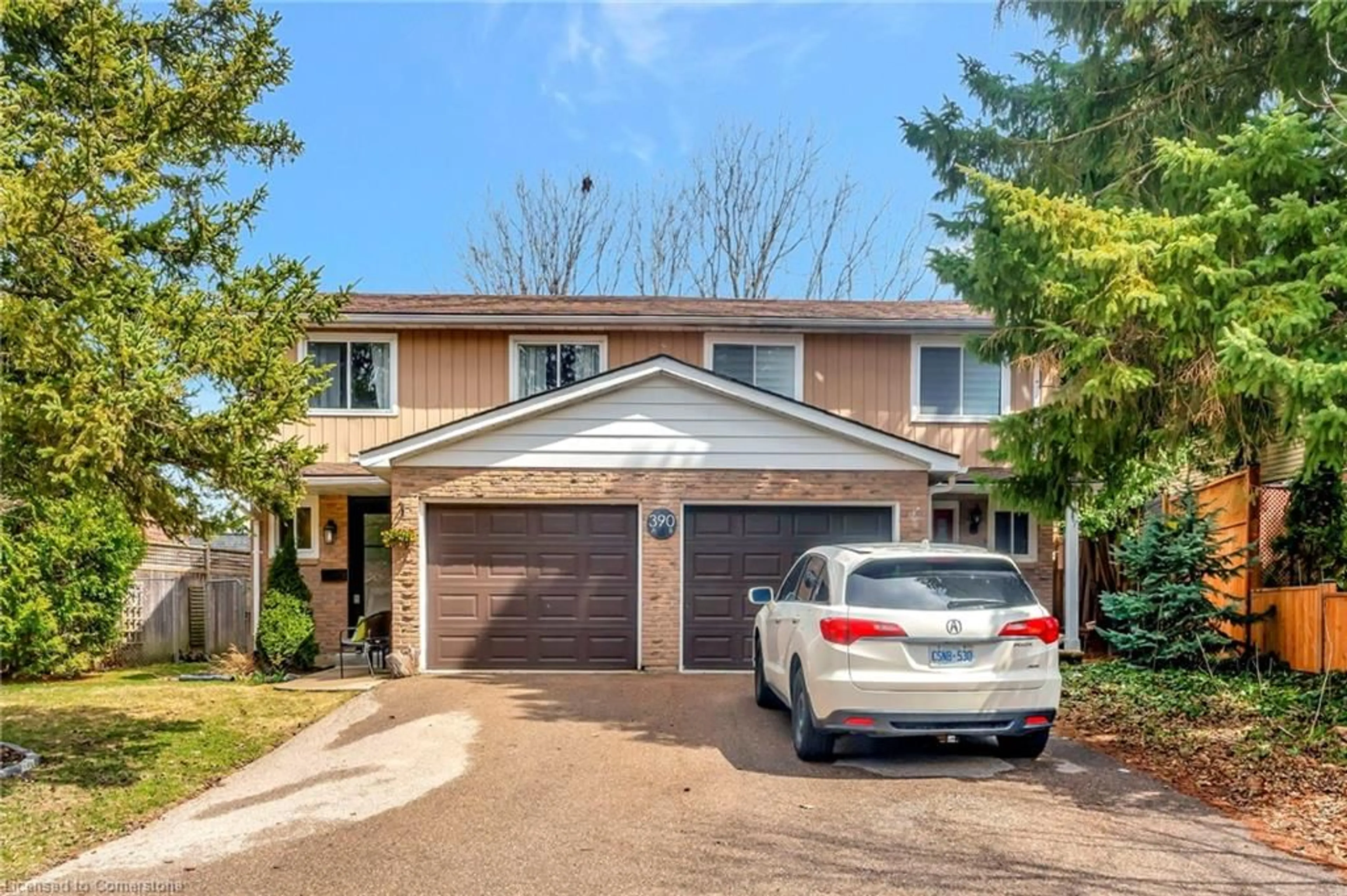 Home with brick exterior material, street for 390 Churchill Crt #A, Waterloo Ontario N2L 6B4