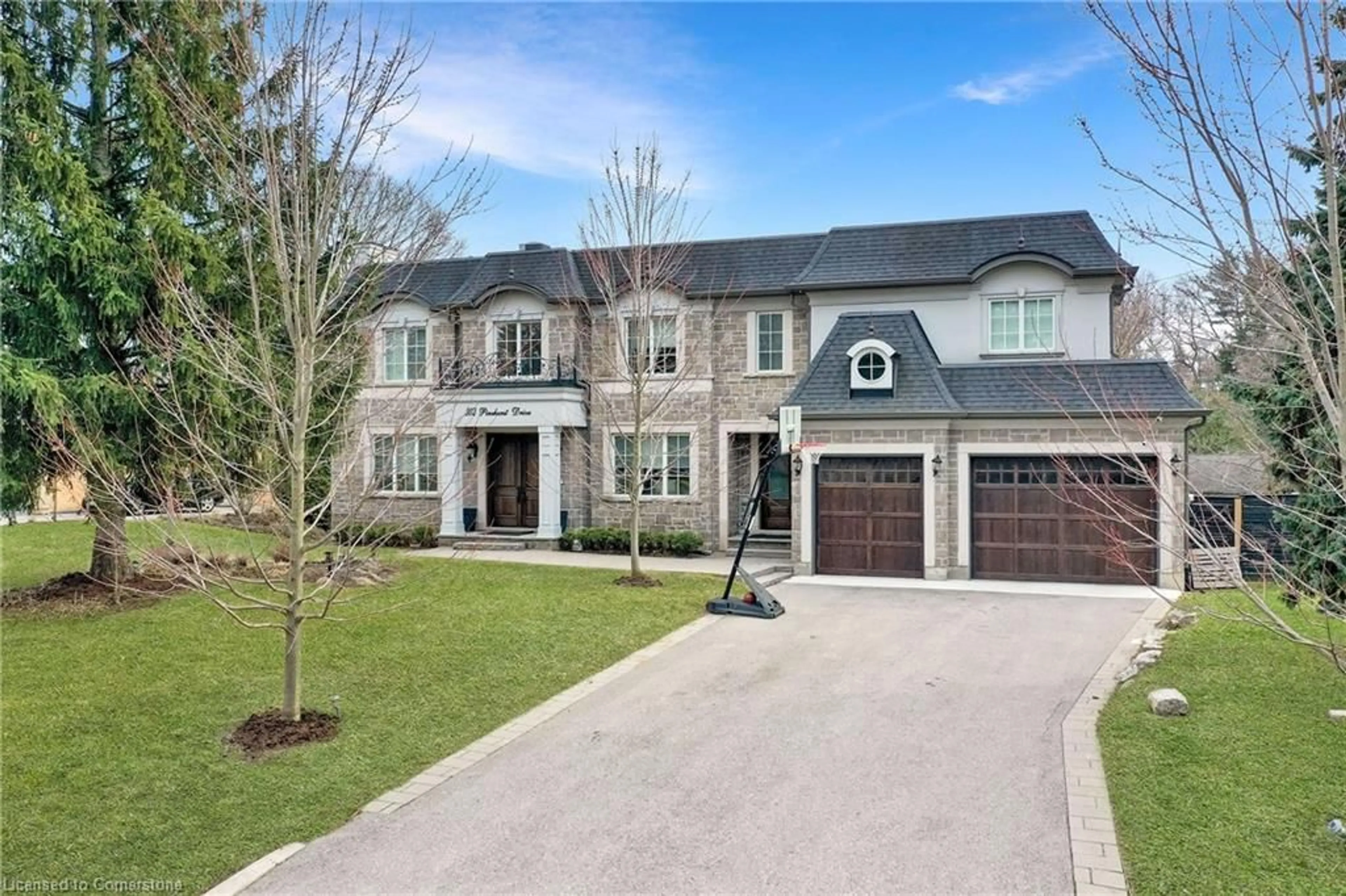 Home with brick exterior material, street for 302 Pinehurst Dr, Oakville Ontario L6J 4X3