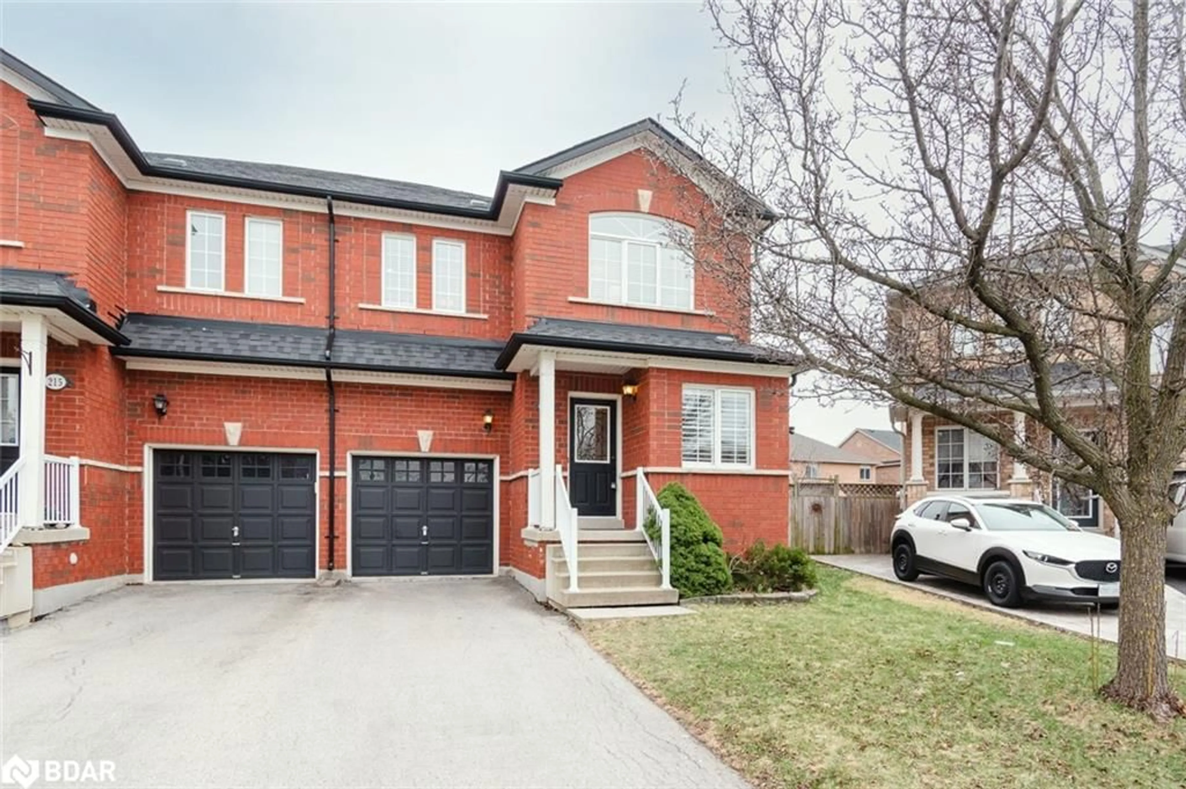 Home with brick exterior material, street for 217 Fitzgerald Cres, Milton Ontario L9T 5Y5