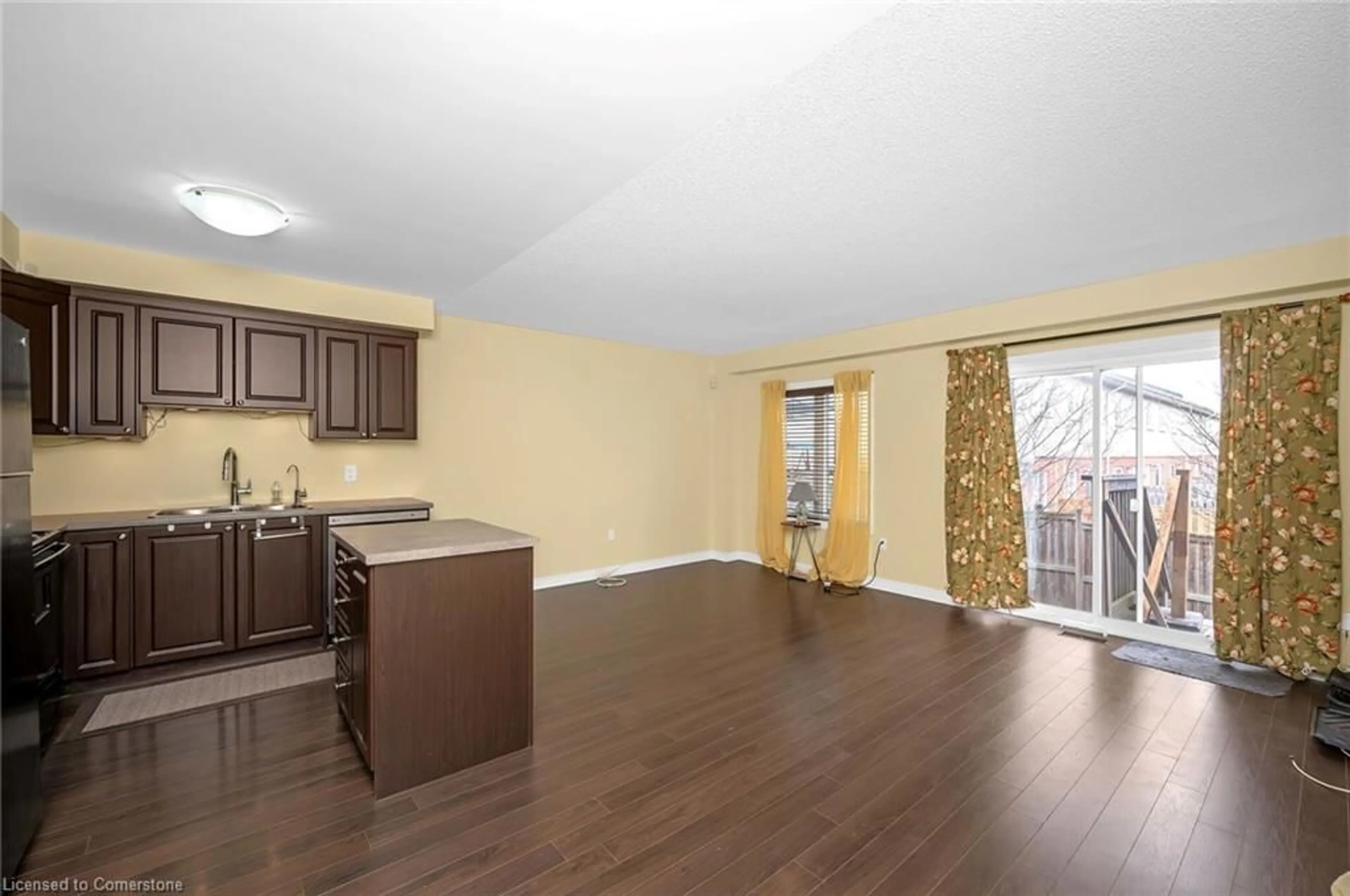 Open concept kitchen, wood/laminate floor for 20 Mcconkey Cres #90, Brantford Ontario N3S 0C1