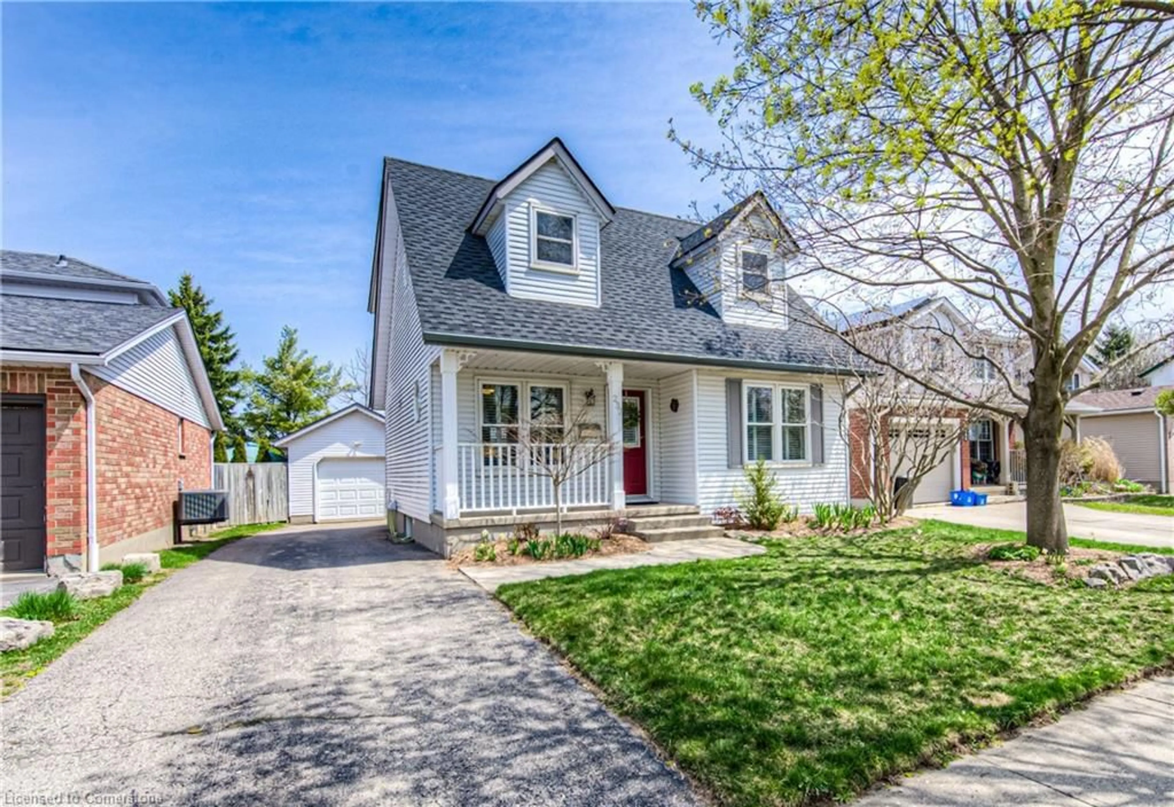 Home with vinyl exterior material, street for 232 Dartmoor Cres, Waterloo Ontario N2K 3S9