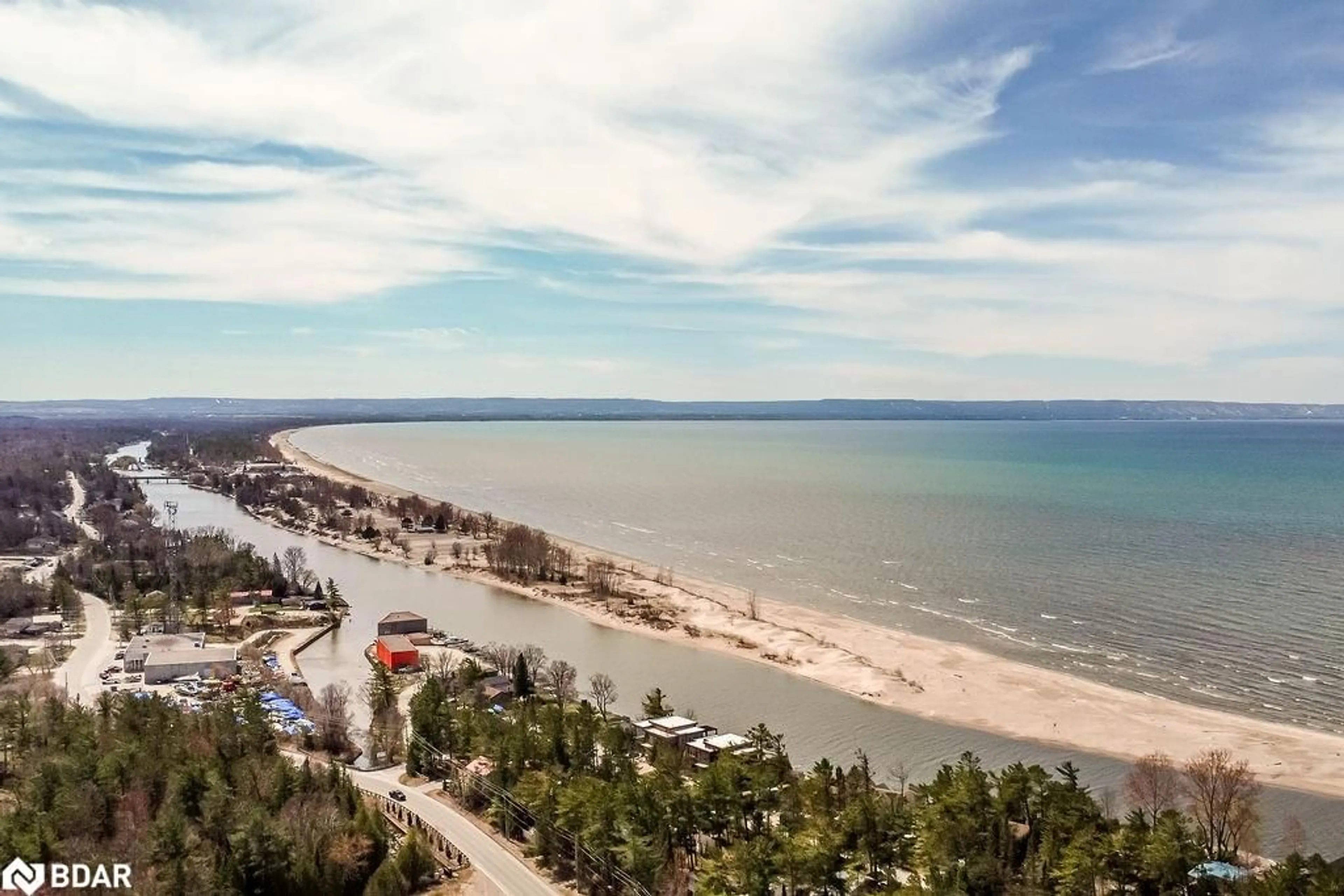 A pic from outside/outdoor area/front of a property/back of a property/a pic from drone, water/lake/river/ocean view for 85 Theme Park Dr #224, Wasaga Beach Ontario L9Z 1X7