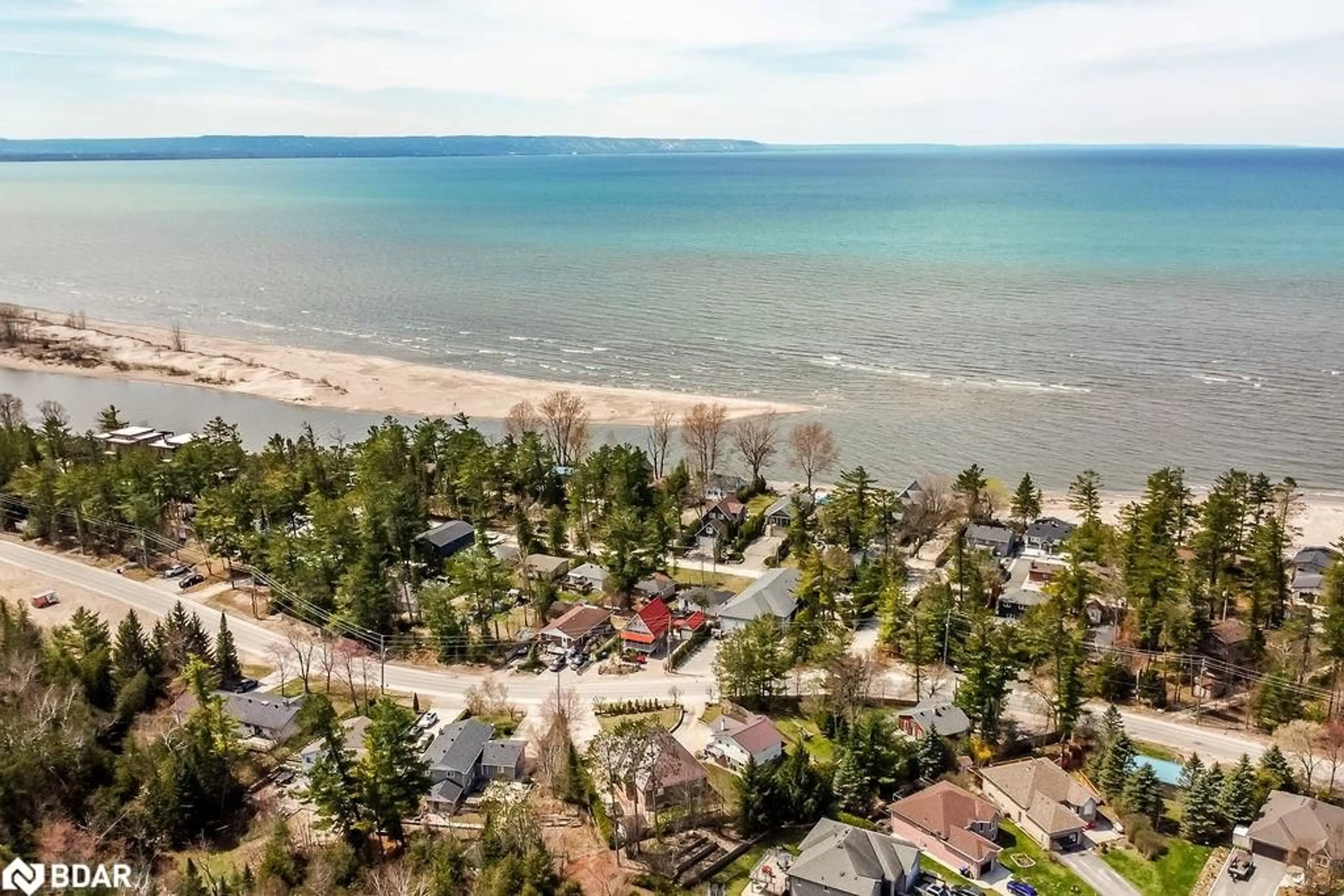 A pic from outside/outdoor area/front of a property/back of a property/a pic from drone, water/lake/river/ocean view for 85 Theme Park Dr #224, Wasaga Beach Ontario L9Z 1X7