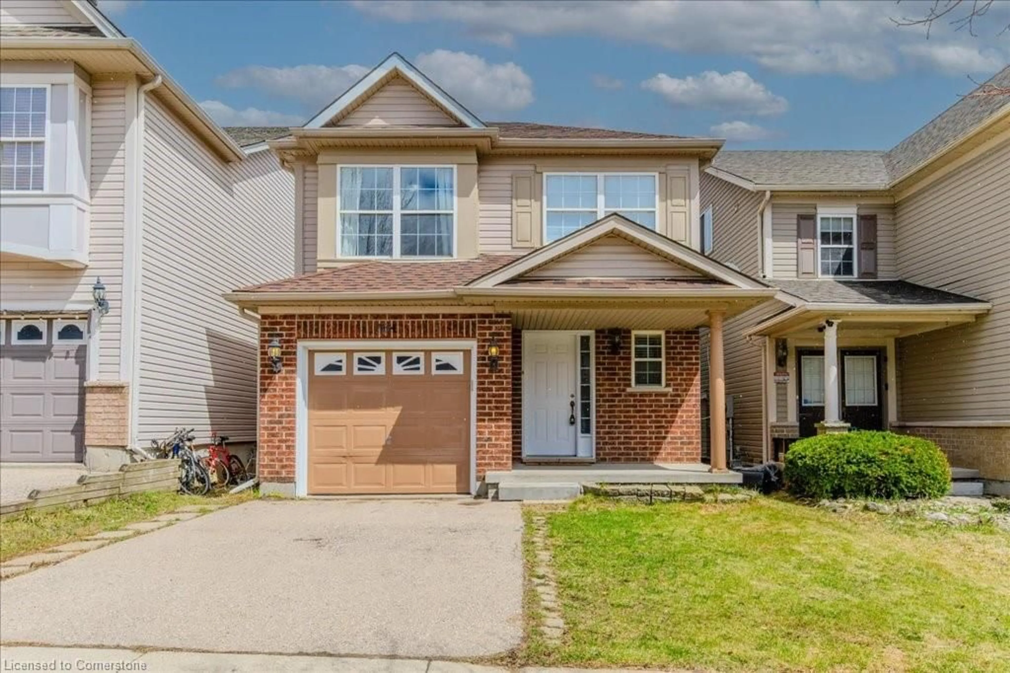 Home with brick exterior material, street for 764 Zermatt Dr, Waterloo Ontario N2T 2W8