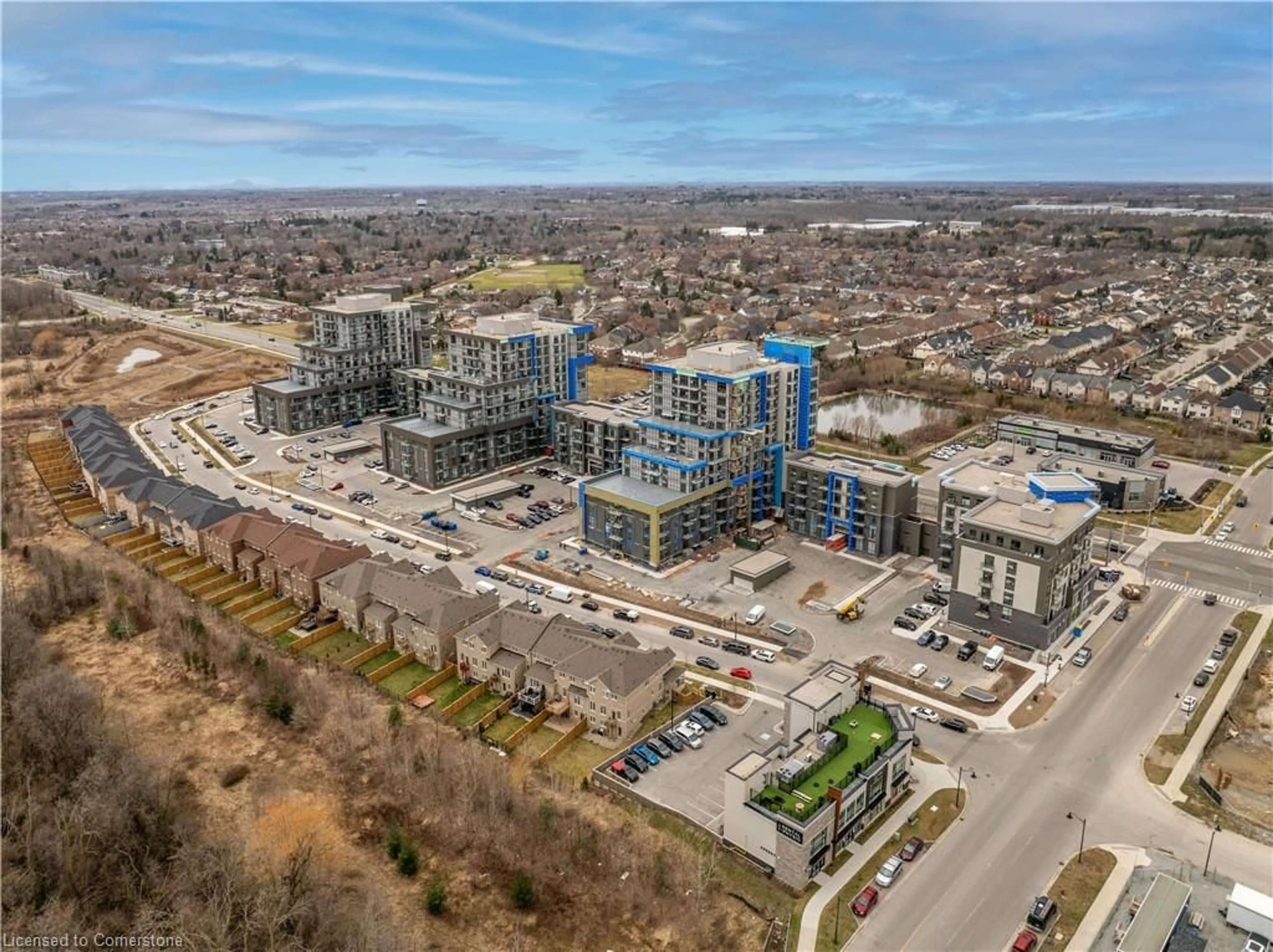 A pic from outside/outdoor area/front of a property/back of a property/a pic from drone, unknown for 460 Dundas St #331, Waterdown Ontario L9B 2A5