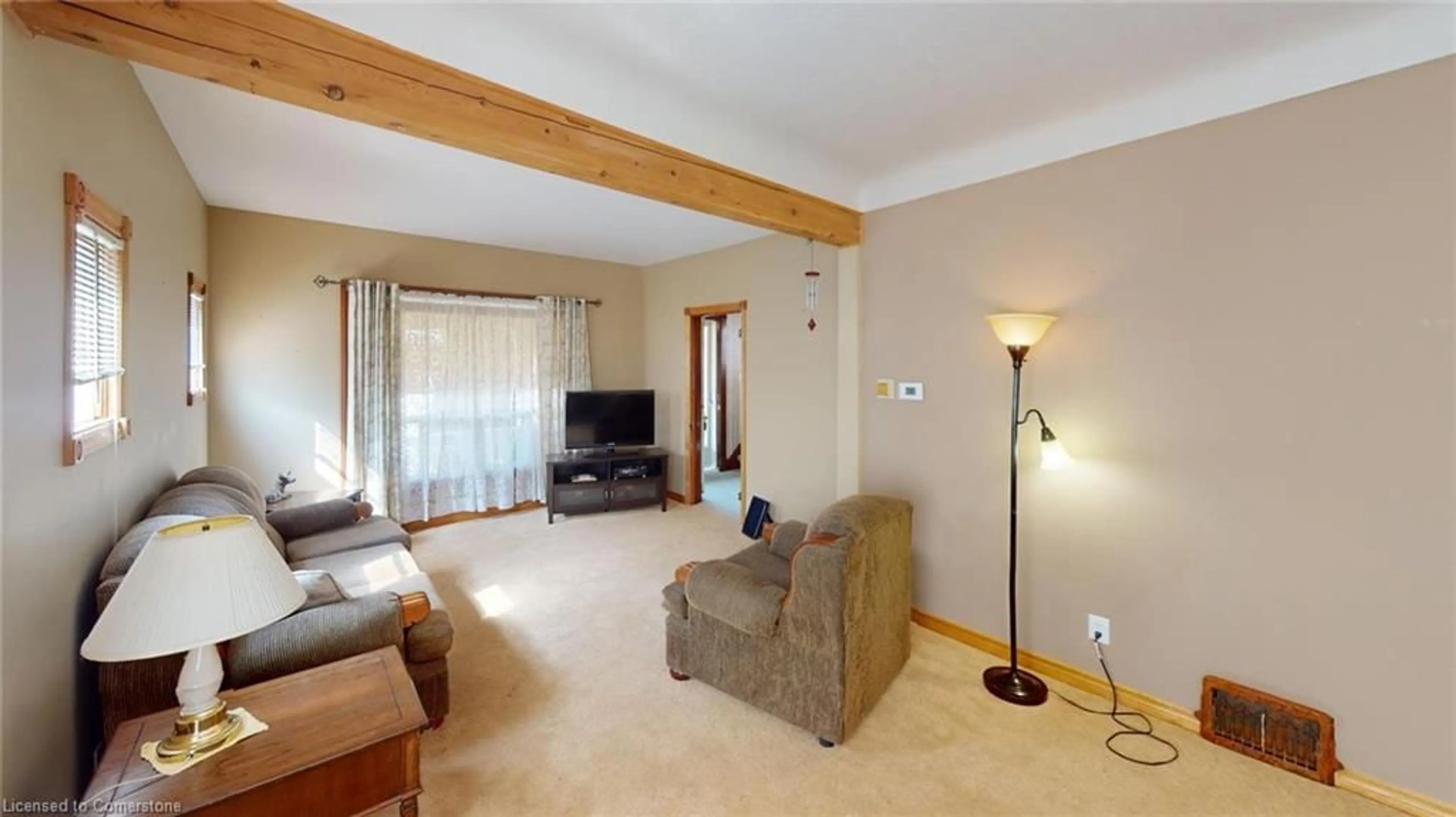 Living room with furniture, wood/laminate floor for 34 Albert St, St. Catharines Ontario L2R 2G7