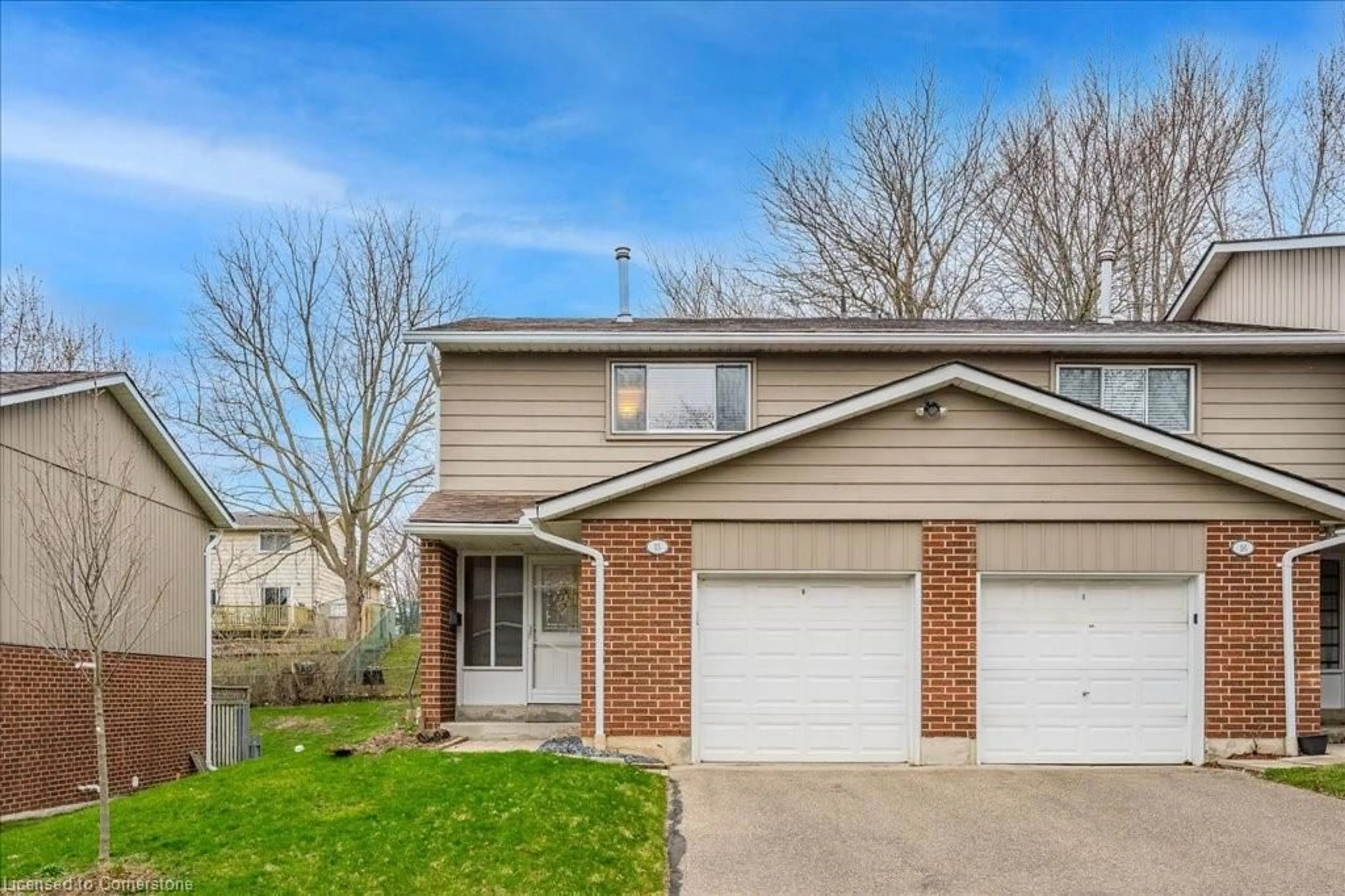 Home with brick exterior material, street for 16 Hadati Rd #15, Guelph Ontario N1E 6M2