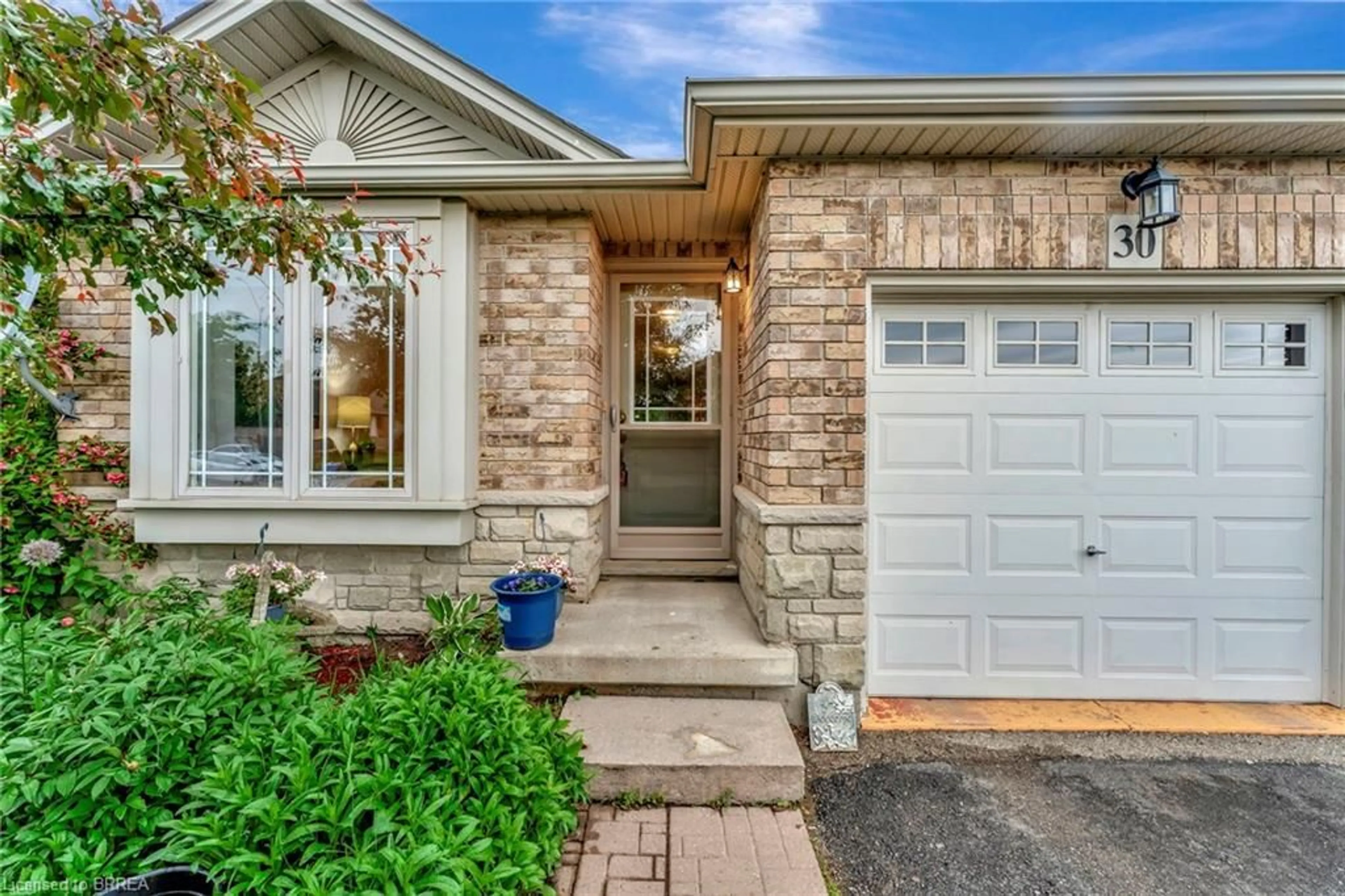 Home with brick exterior material, street for 30 Savannah Ridge Dr, Paris Ontario N3L 4G5
