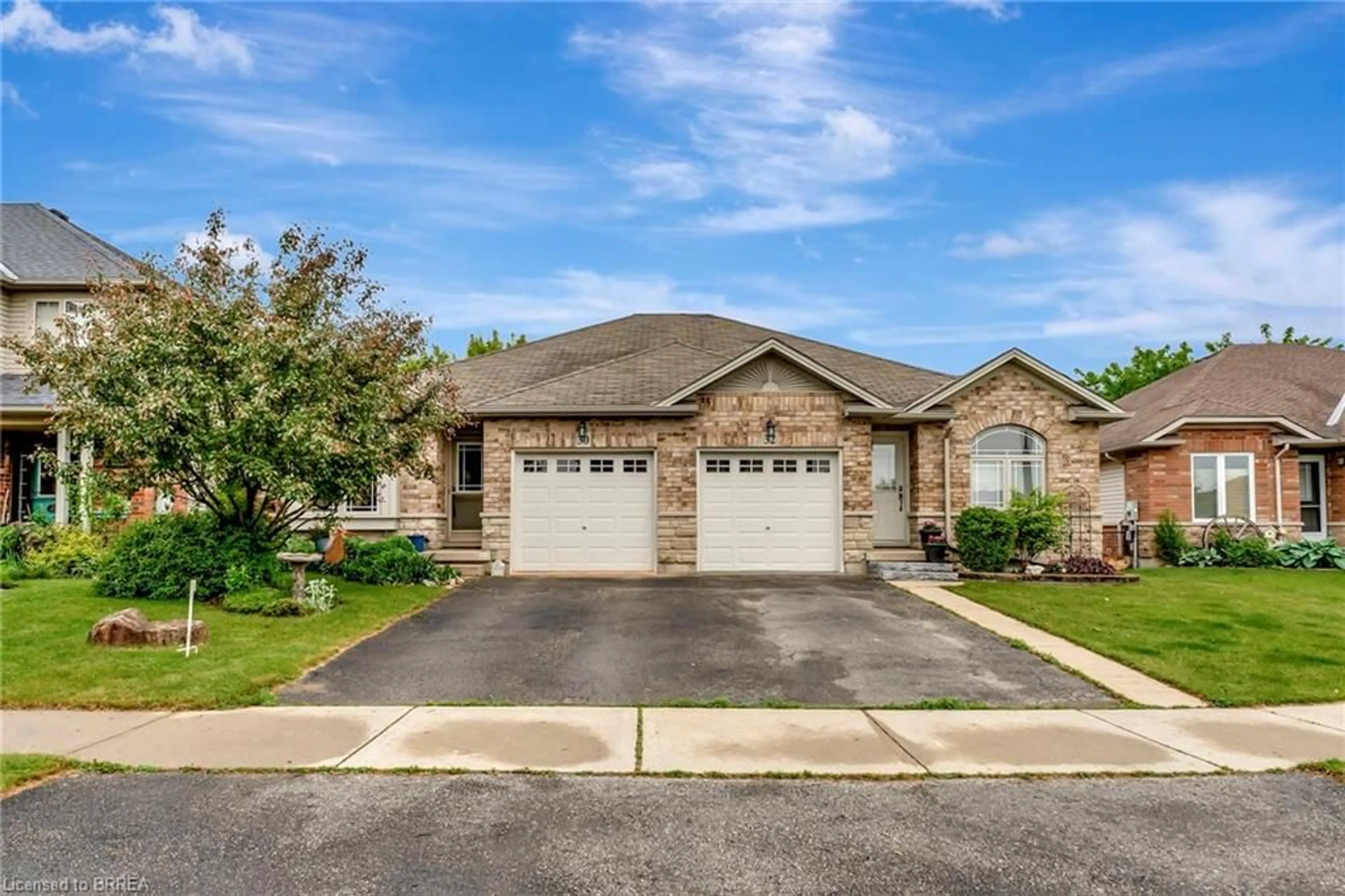 Home with brick exterior material, street for 30 Savannah Ridge Dr, Paris Ontario N3L 4G5