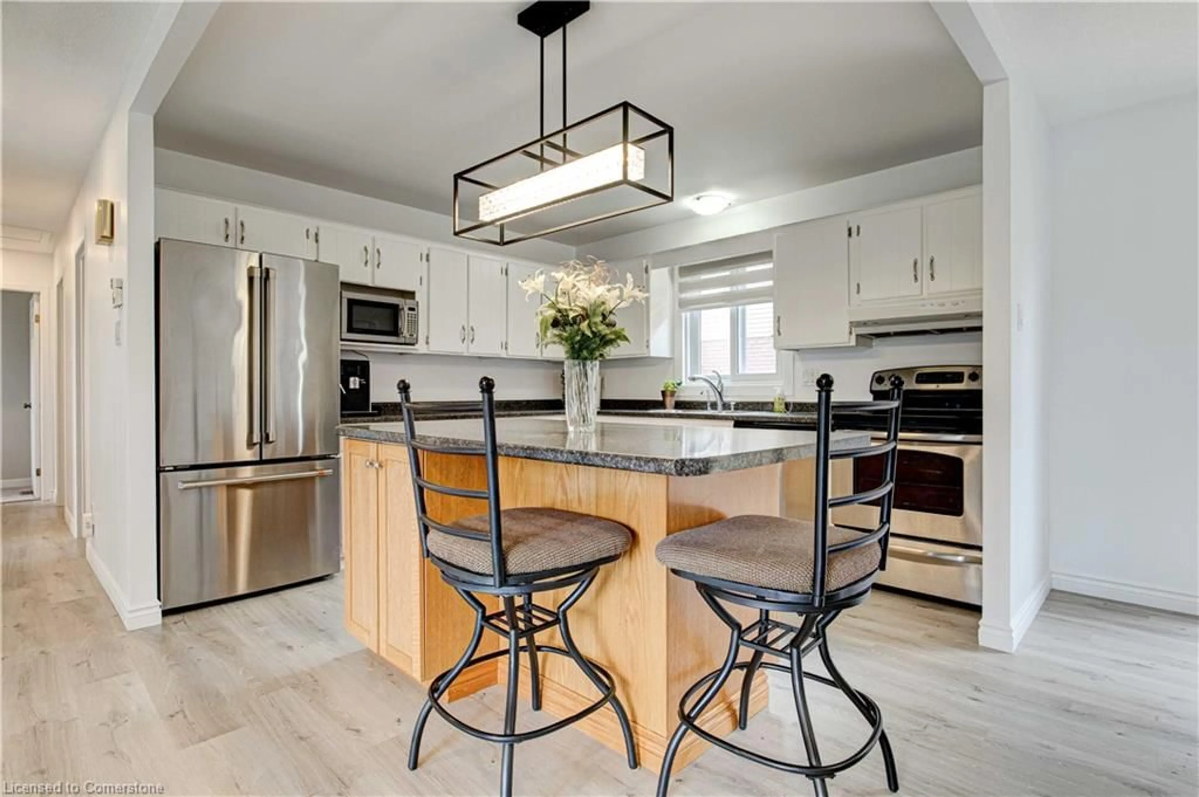 Open concept kitchen, ceramic/tile floor for 238 Foxhunt Rd, Waterloo Ontario N2K 2R9