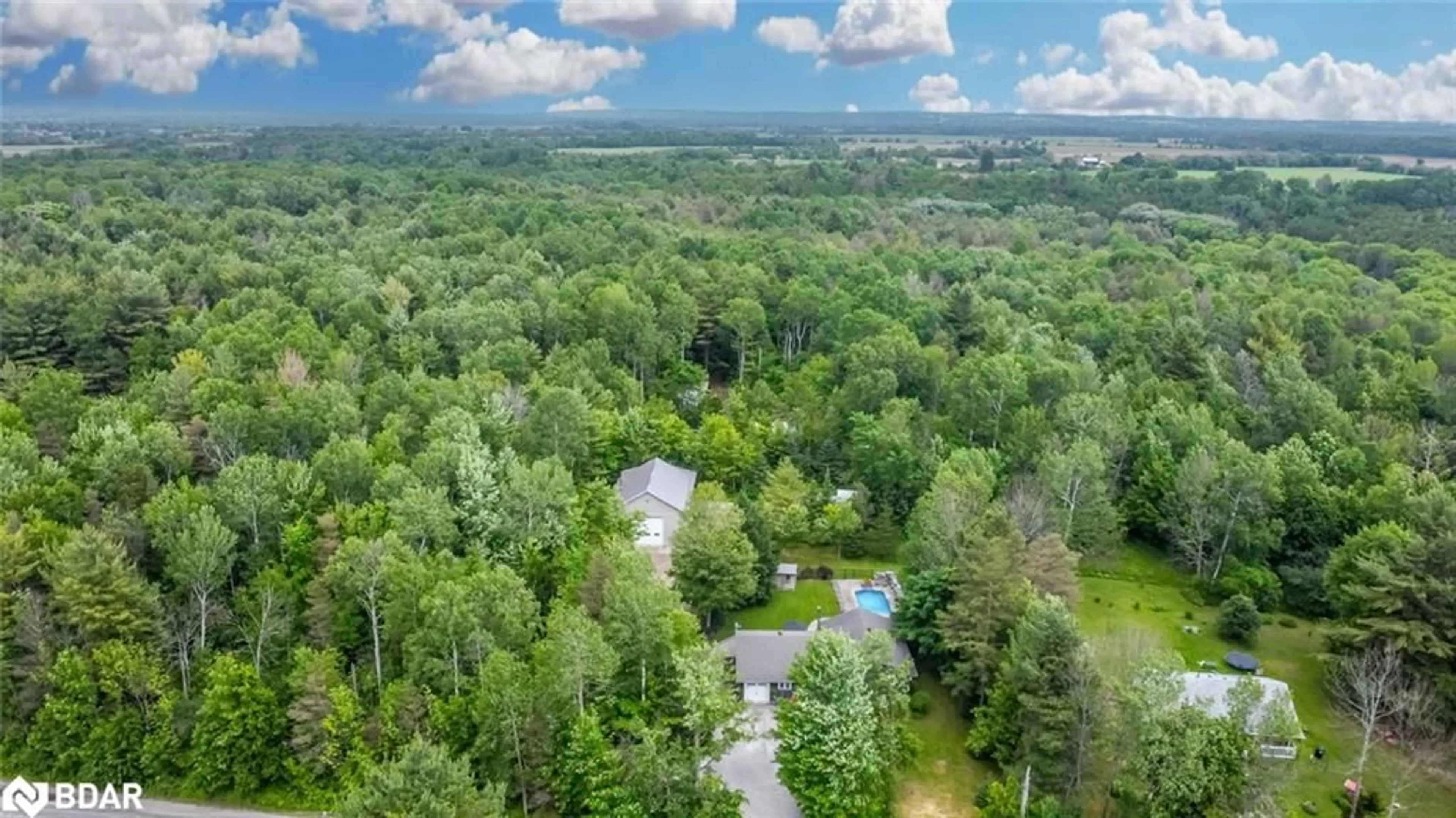 A pic from outside/outdoor area/front of a property/back of a property/a pic from drone, forest/trees view for 8071 4th Line, Angus Ontario L0M 1B1