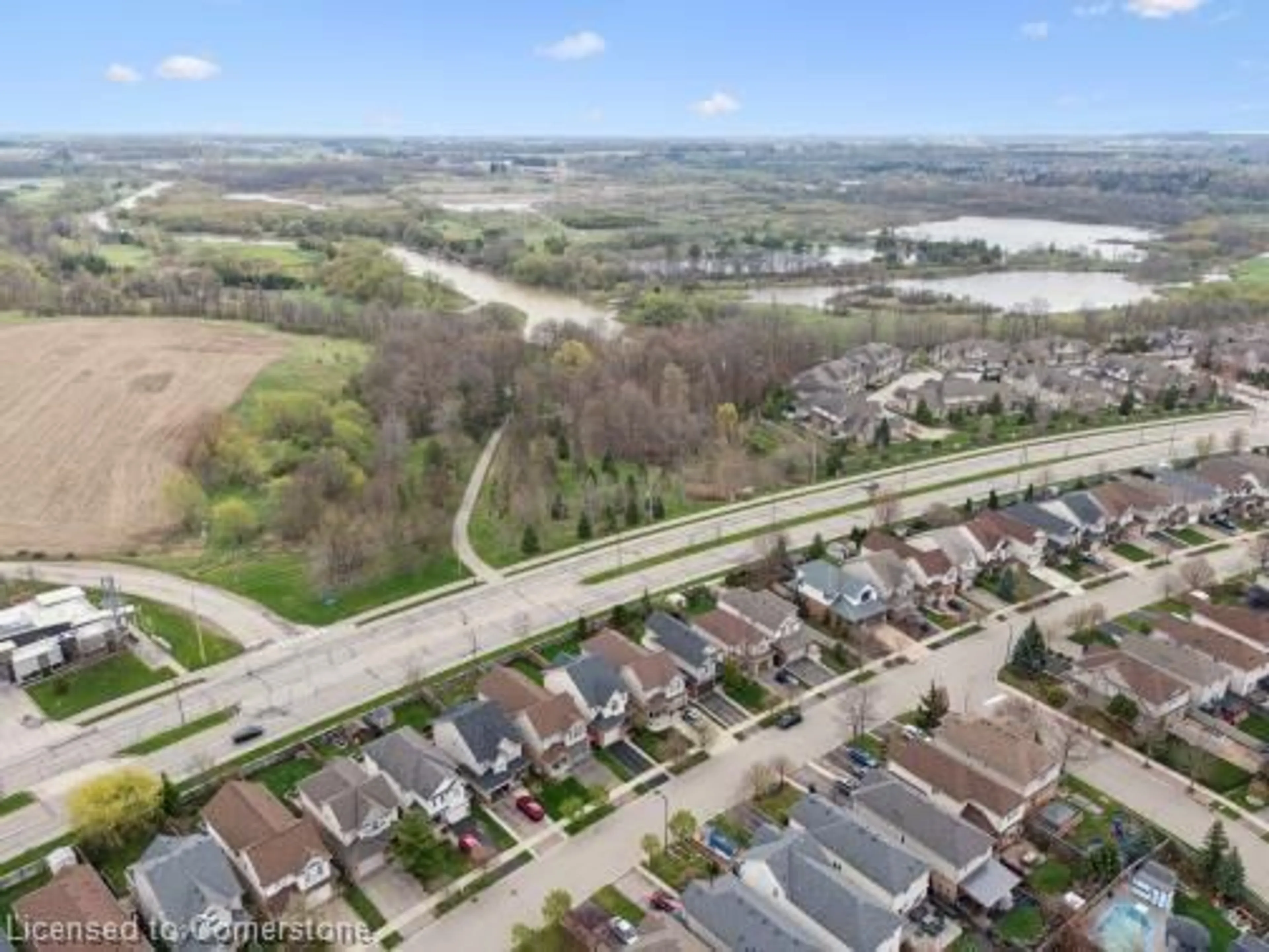 A pic from outside/outdoor area/front of a property/back of a property/a pic from drone, water/lake/river/ocean view for 751 Grand Banks Dr, Waterloo Ontario N2K 4N2