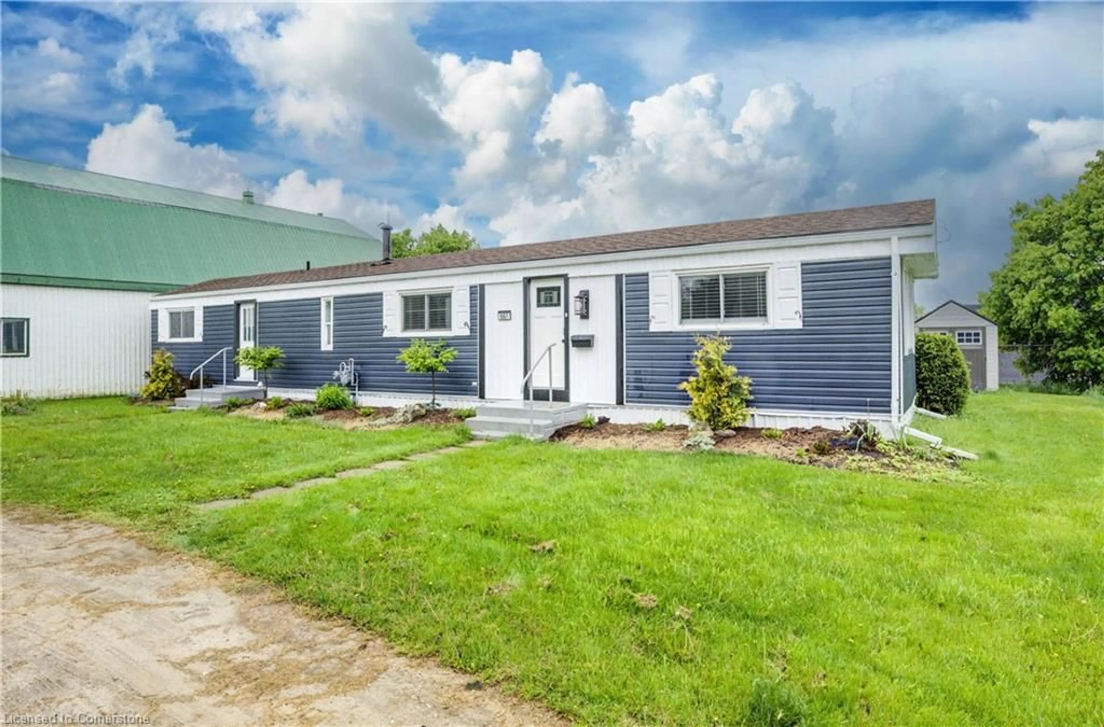 Home with vinyl exterior material, street for 84 Wellington St #7, Drayton Ontario N0G 1P0