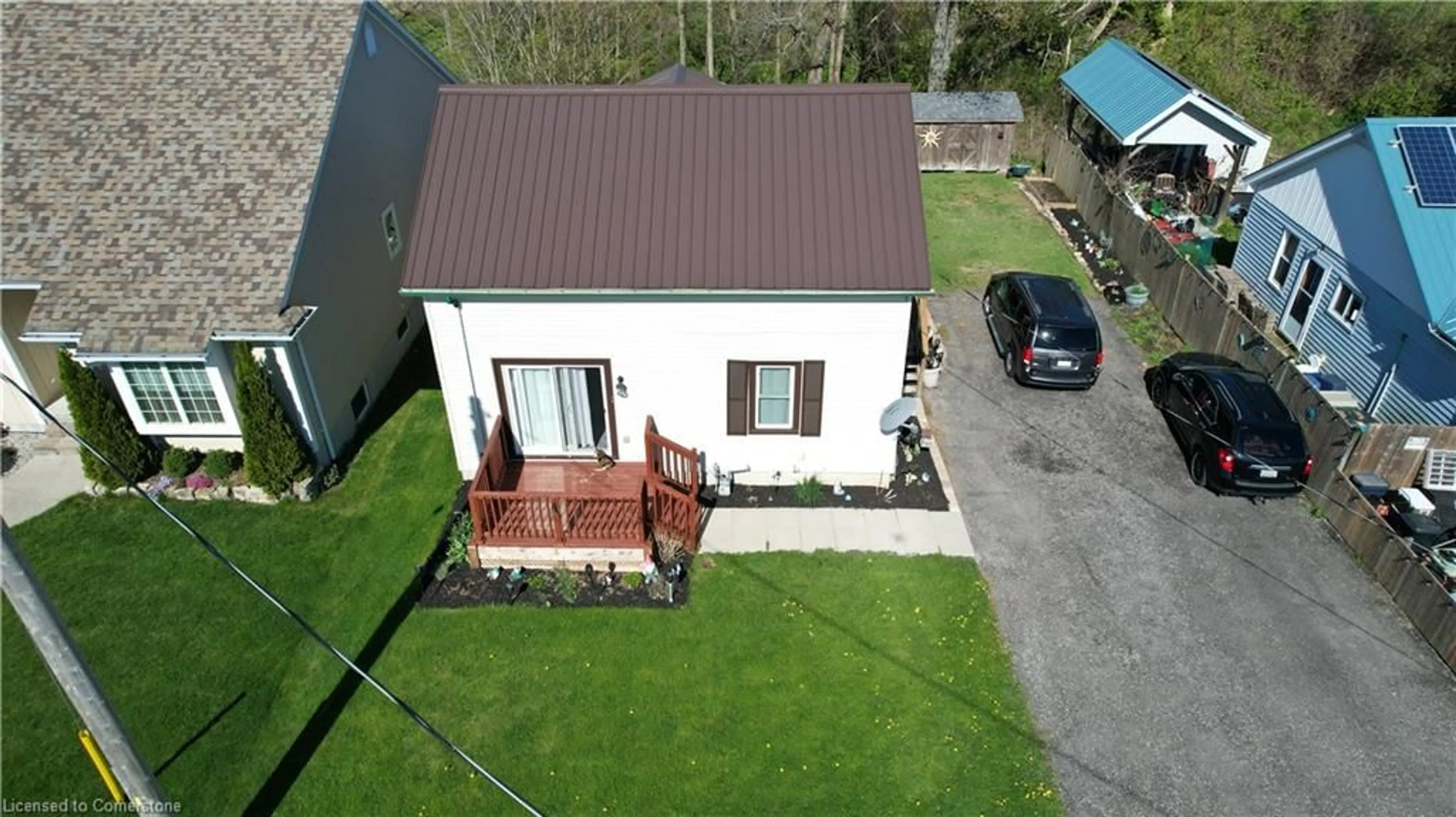 A pic from outside/outdoor area/front of a property/back of a property/a pic from drone, street for 12 Grave St, Port Rowan Ontario N0E 1M0