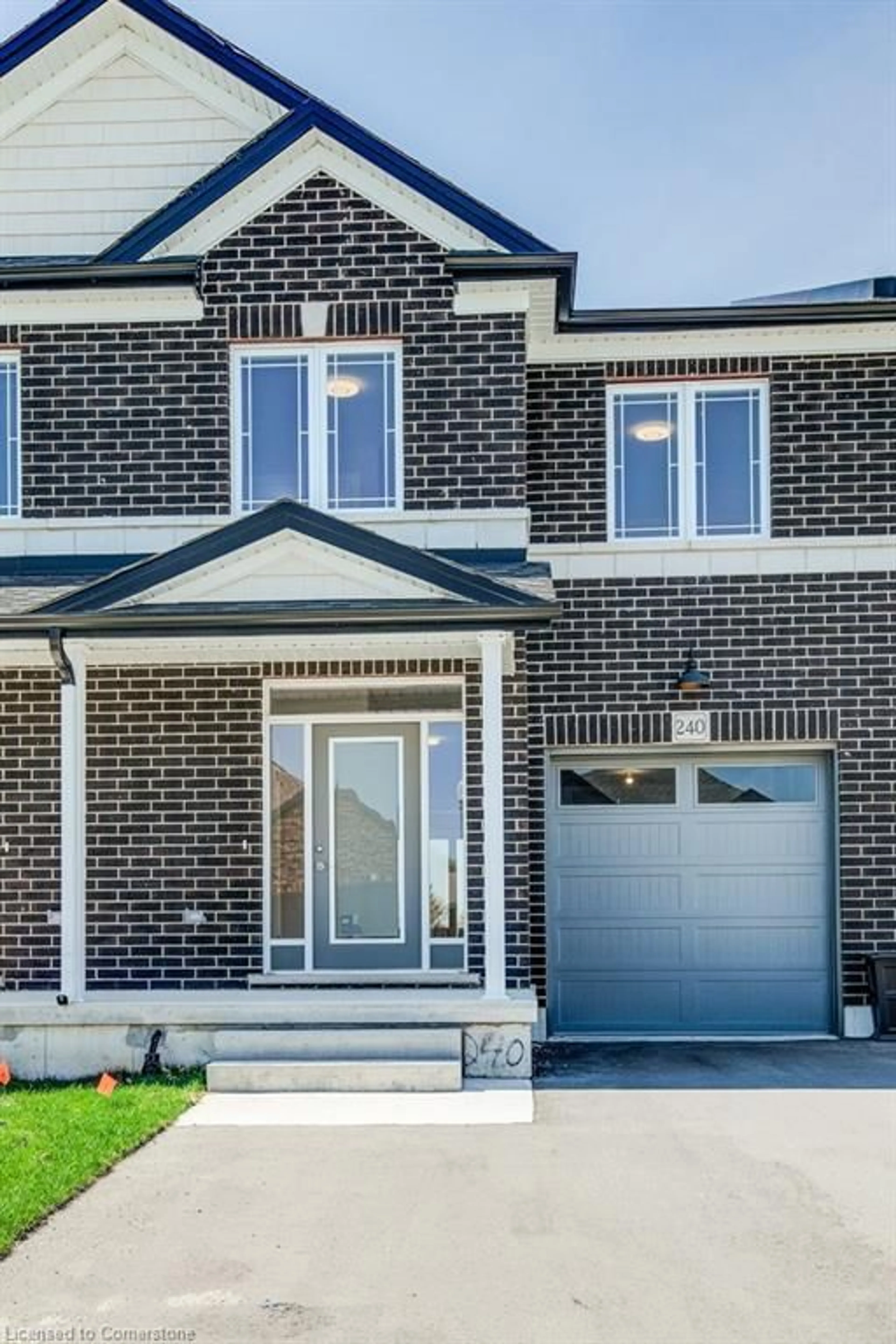 Home with brick exterior material, street for 240 Keeso Lane, Listowel Ontario N4W 0C3