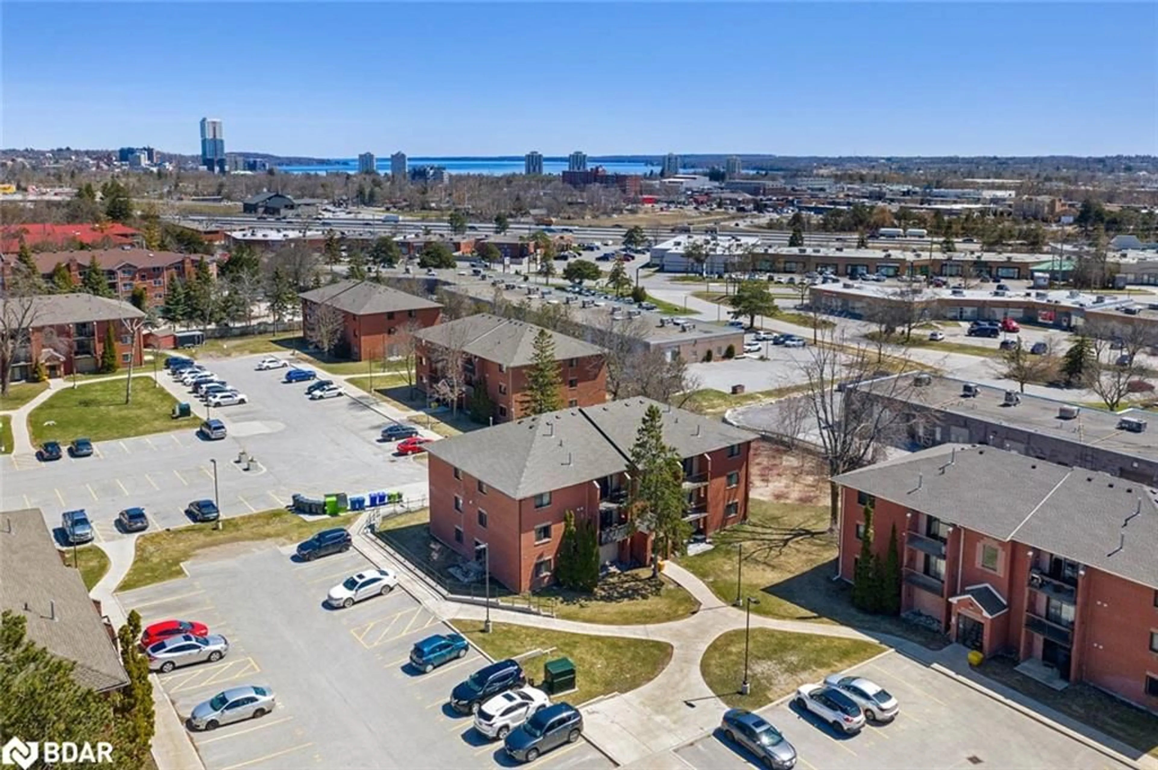 A pic from outside/outdoor area/front of a property/back of a property/a pic from drone, city buildings view from balcony for 167 Edgehill Dr #E5, Barrie Ontario L4N 1L9