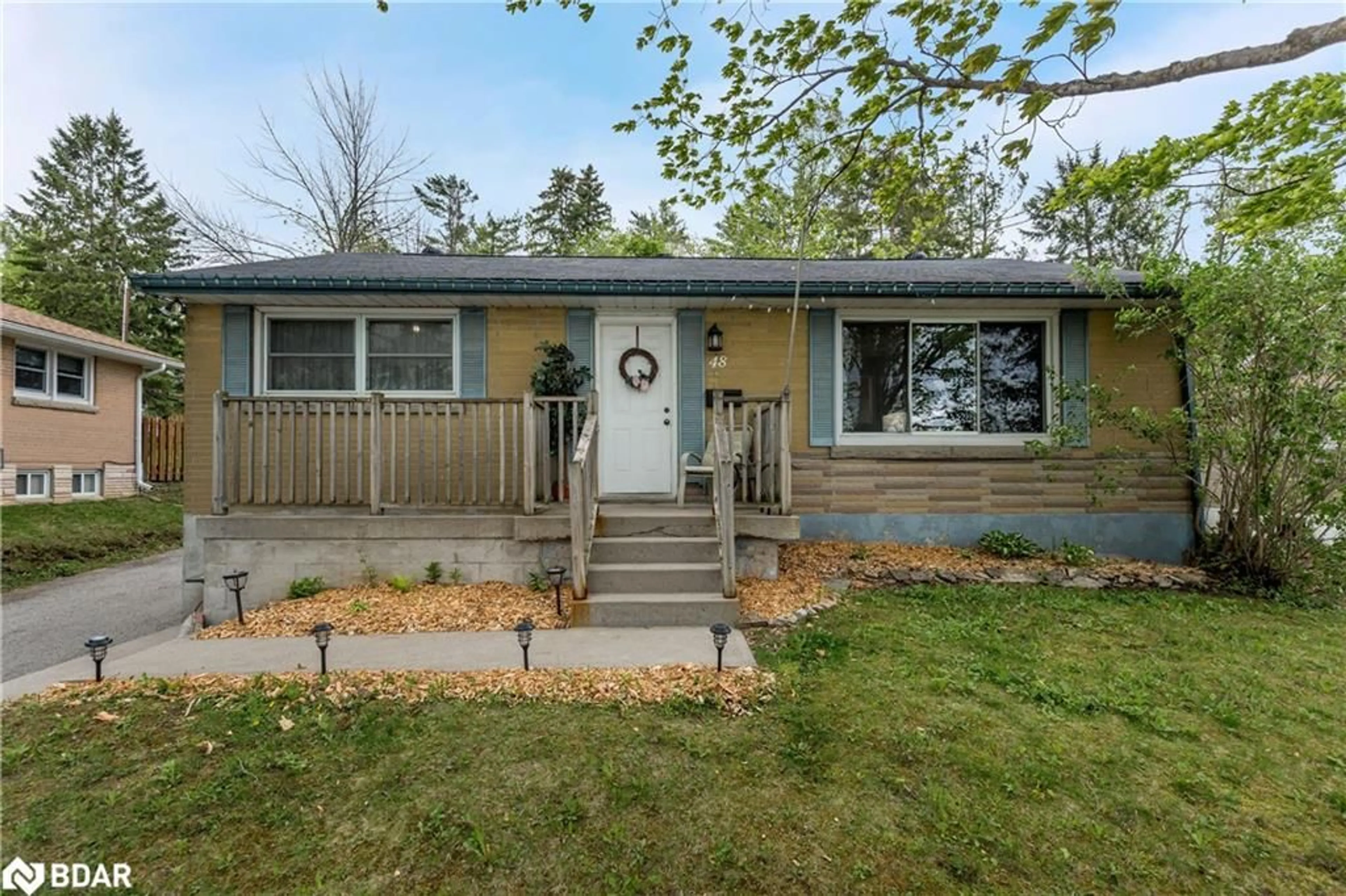 Home with vinyl exterior material, street for 48 Brant St, Orillia Ontario L3V 3N7
