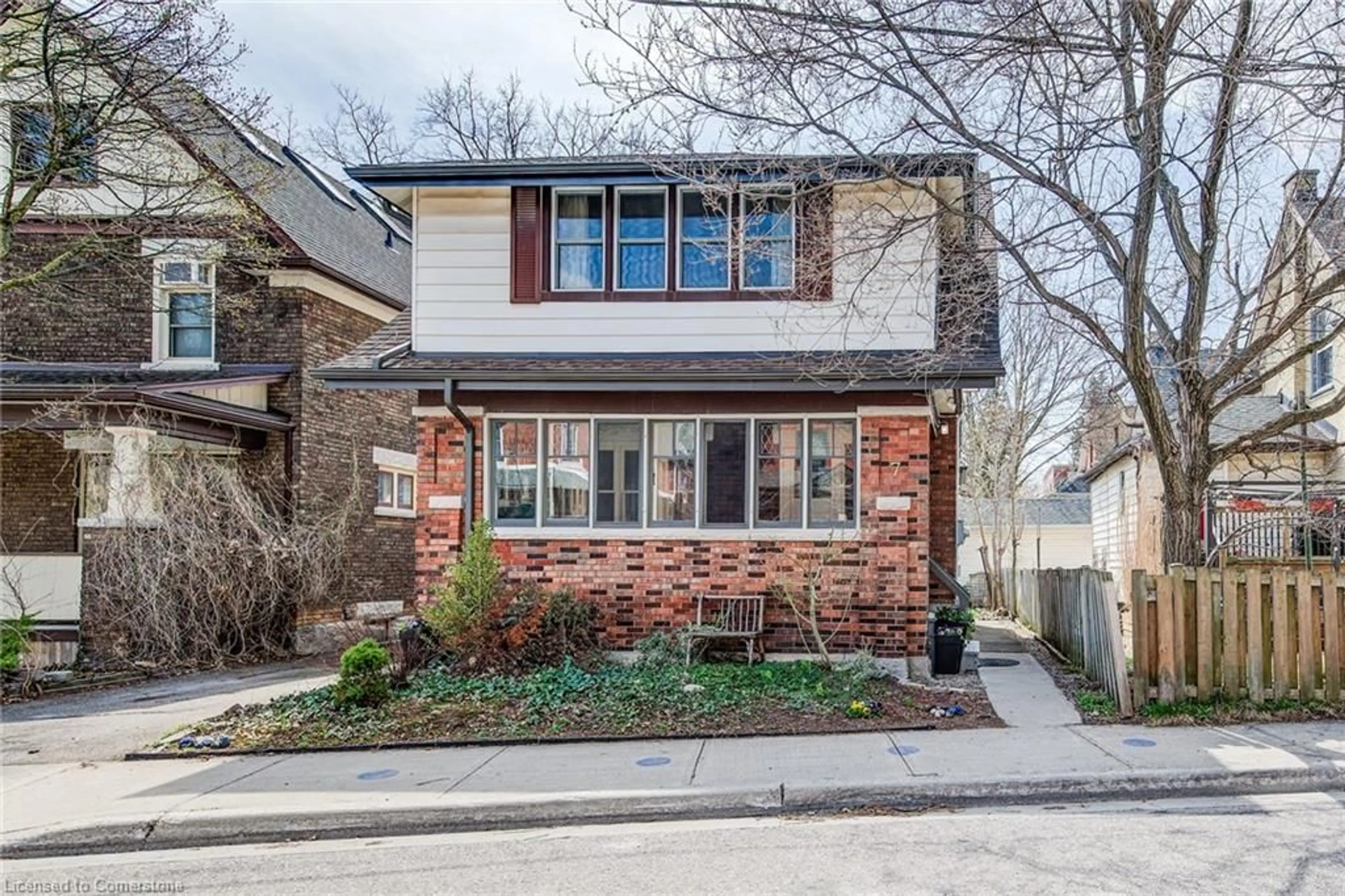 Home with brick exterior material, street for 7 Dekay St, Kitchener Ontario N2H 3T1