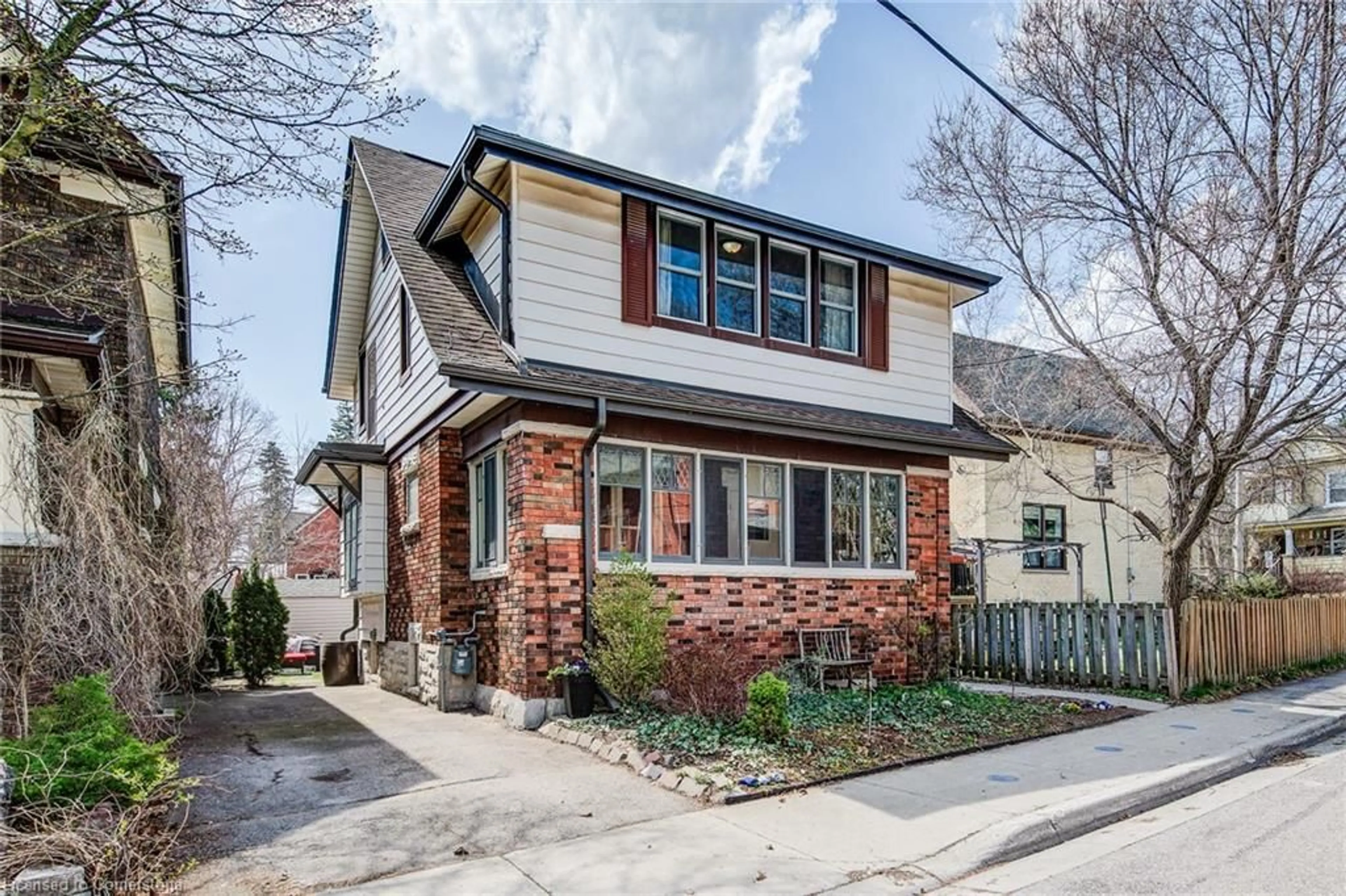 Home with brick exterior material, street for 7 Dekay St, Kitchener Ontario N2H 3T1