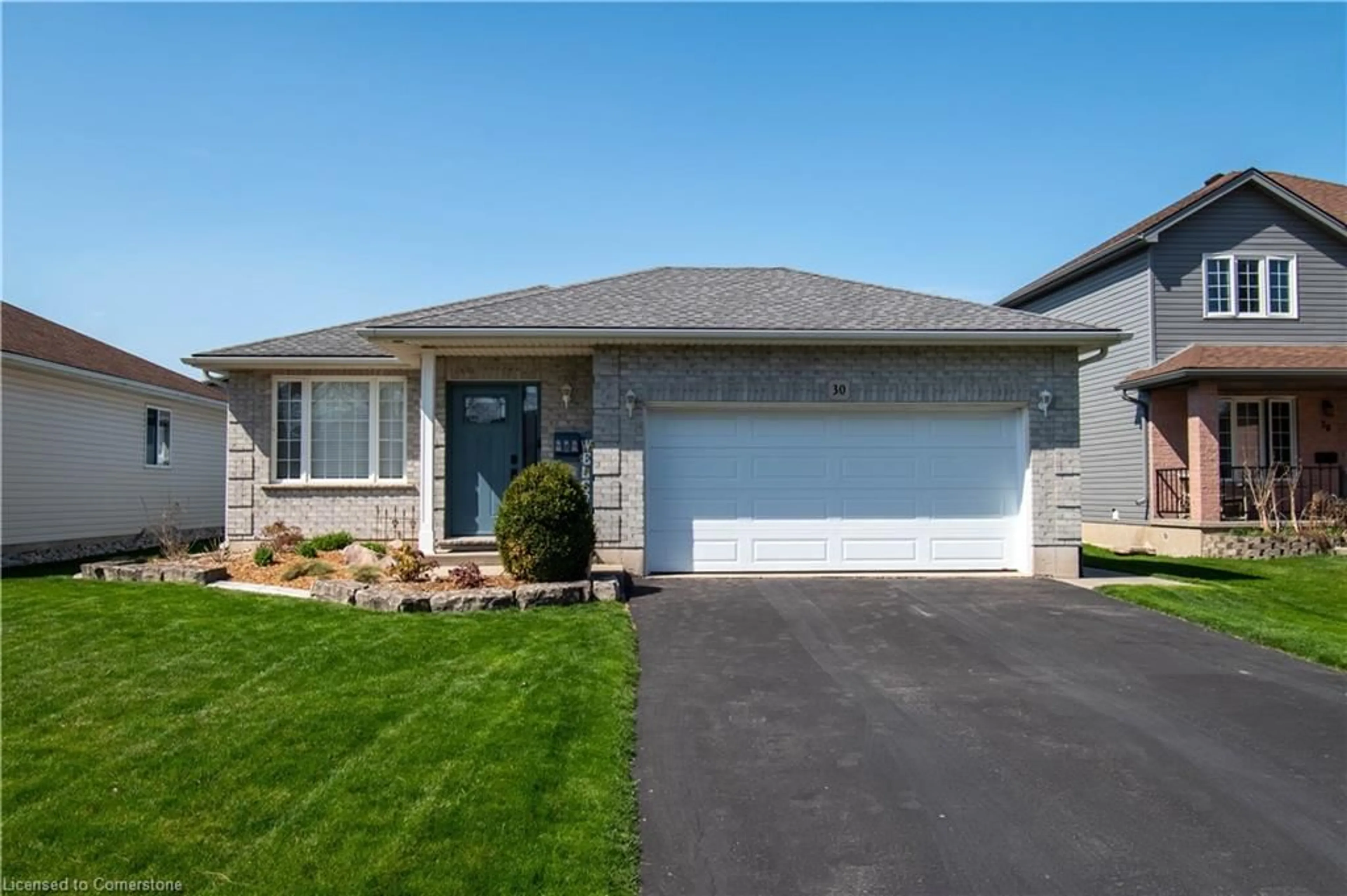 Home with vinyl exterior material, street for 30 Beech Blvd, Tillsonburg Ontario N4G 5R8
