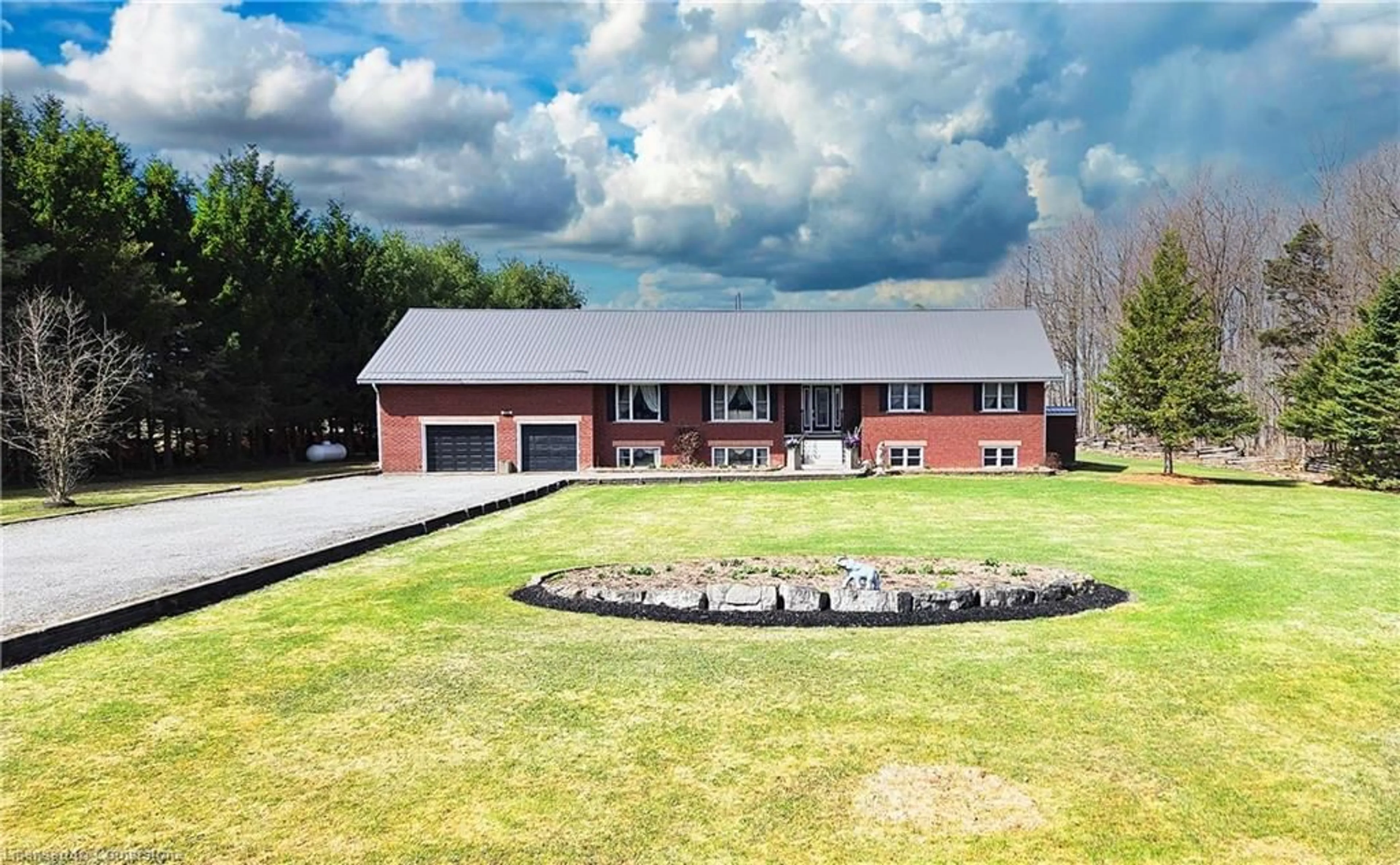 A pic from outside/outdoor area/front of a property/back of a property/a pic from drone, building for 9534 Sideroad 3, Wellington North Ontario N0G 1N0