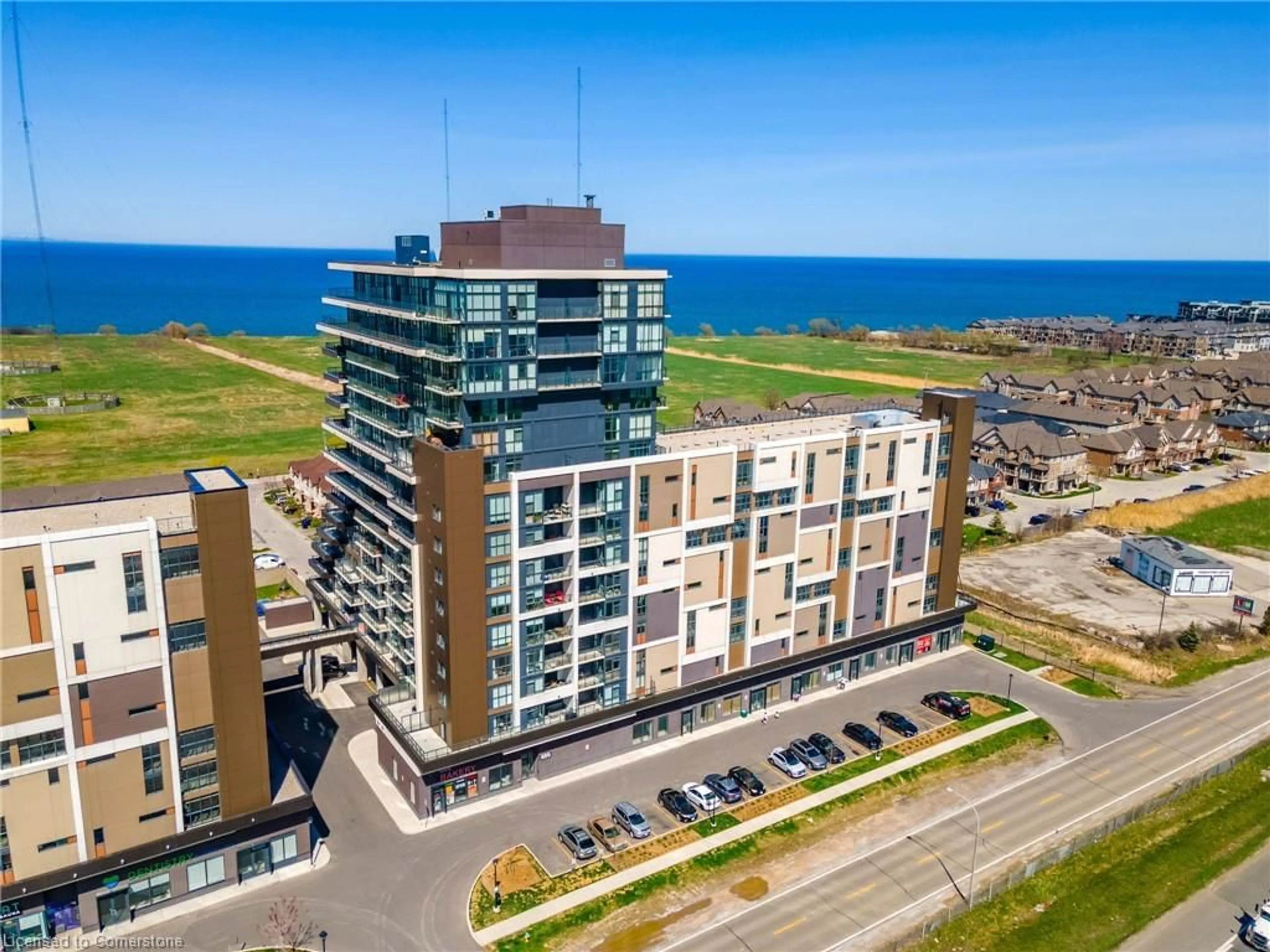 A pic from outside/outdoor area/front of a property/back of a property/a pic from drone, building for 550 North Service Rd #404, Grimsby Ontario L3M 4E8