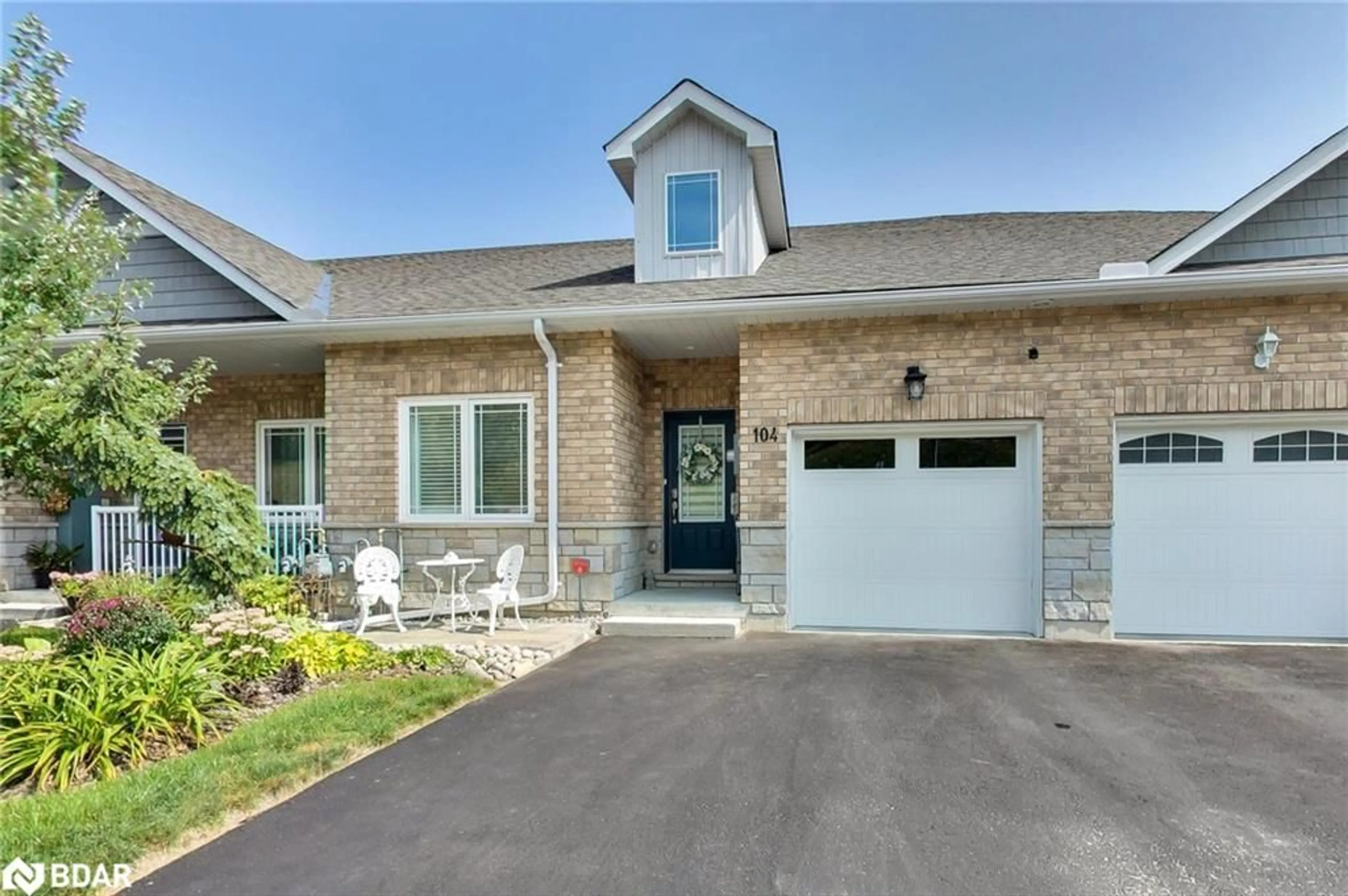 Home with brick exterior material, street for 104 Lily Drive Dr, Orillia Ontario L3V 0G3