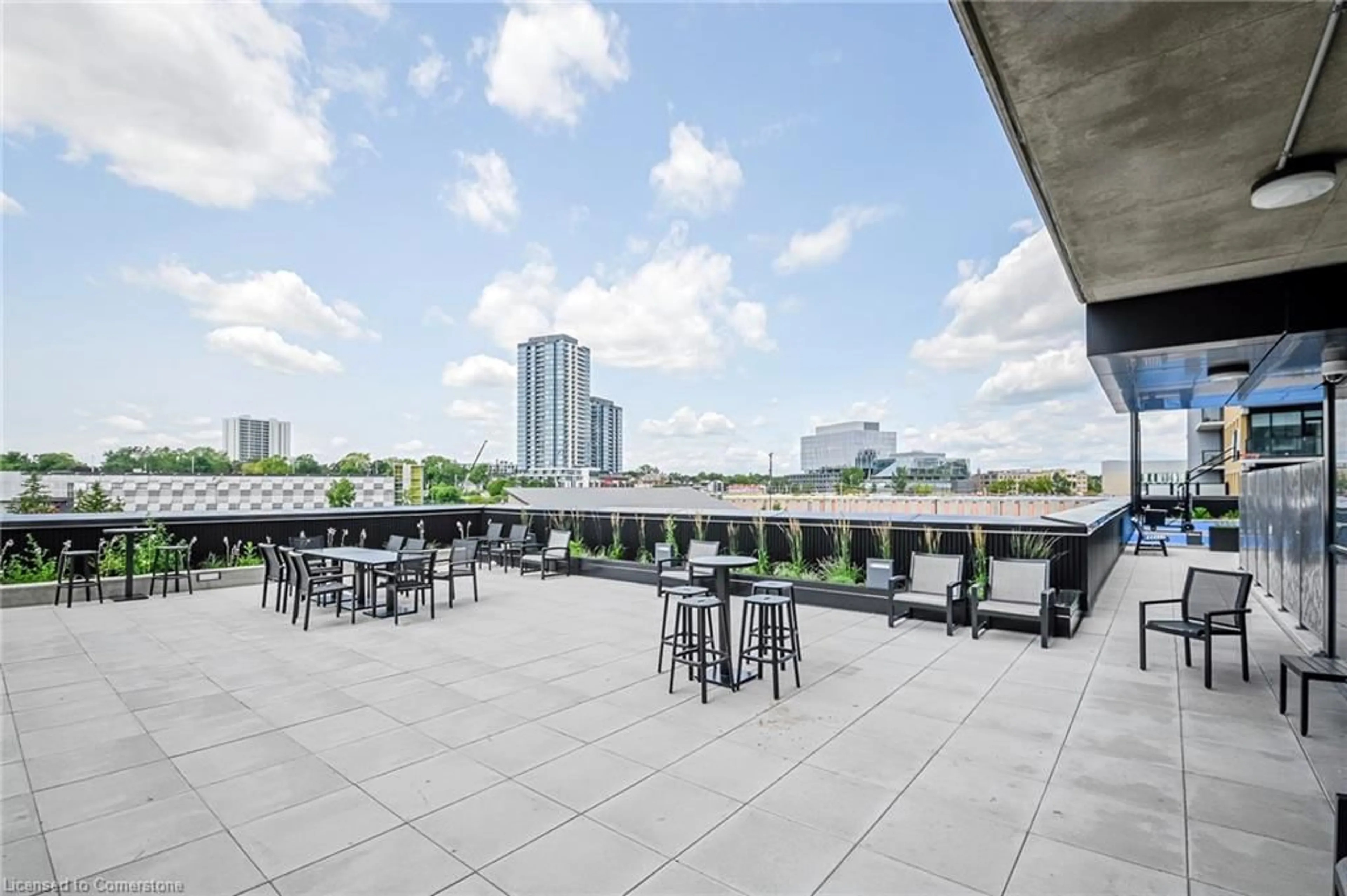Patio, city buildings view from balcony for 108 Garment St #1511, Kitchener Ontario N2G 2B3