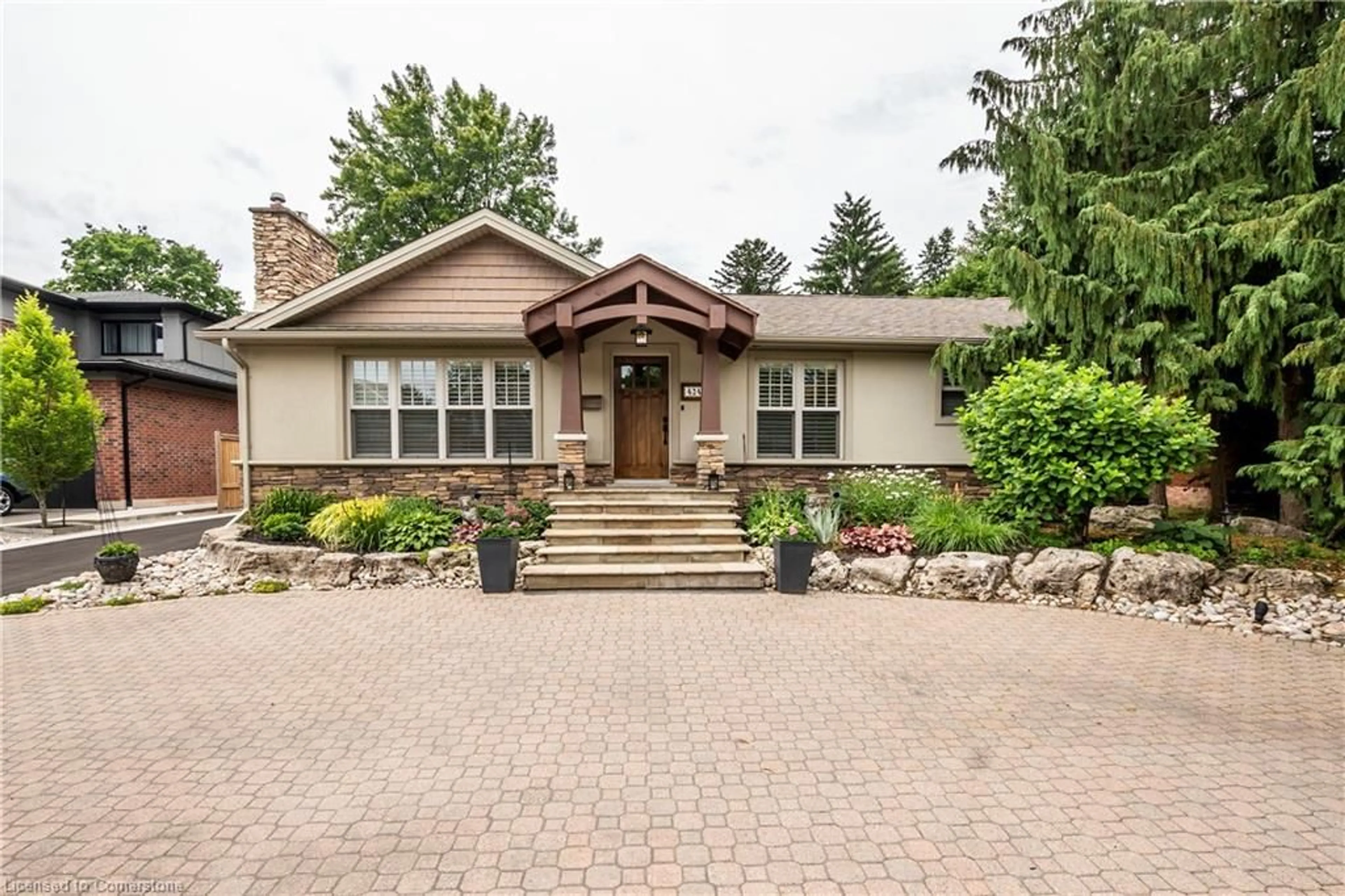 Home with brick exterior material, street for 424 Henderson Rd, Burlington Ontario L7L 2P8