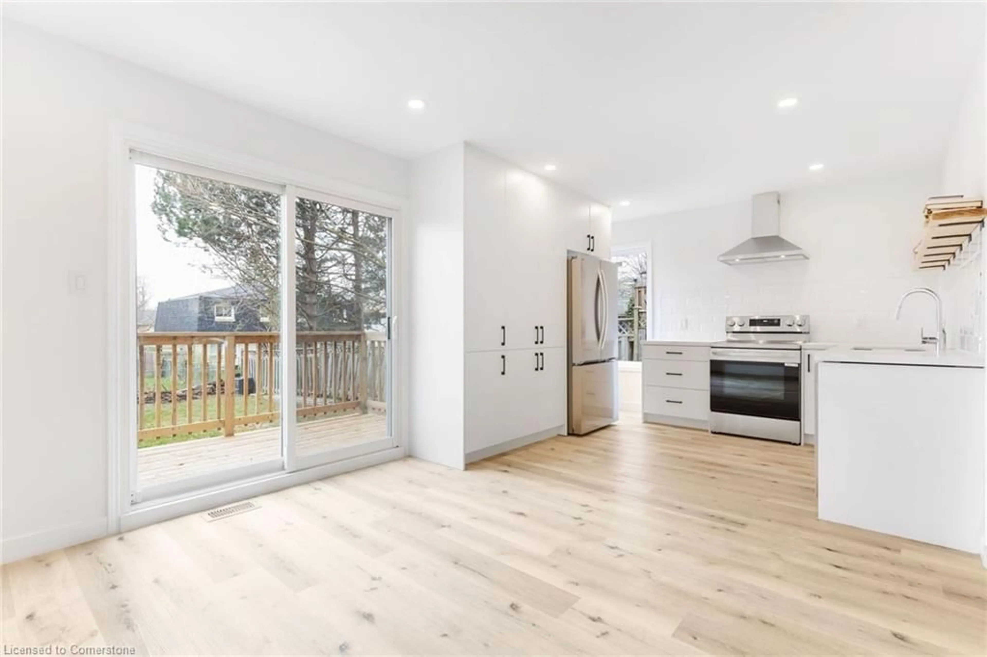 Open concept kitchen, wood/laminate floor for 378 Churchill Crt #B, Waterloo Ontario N2L 6B4